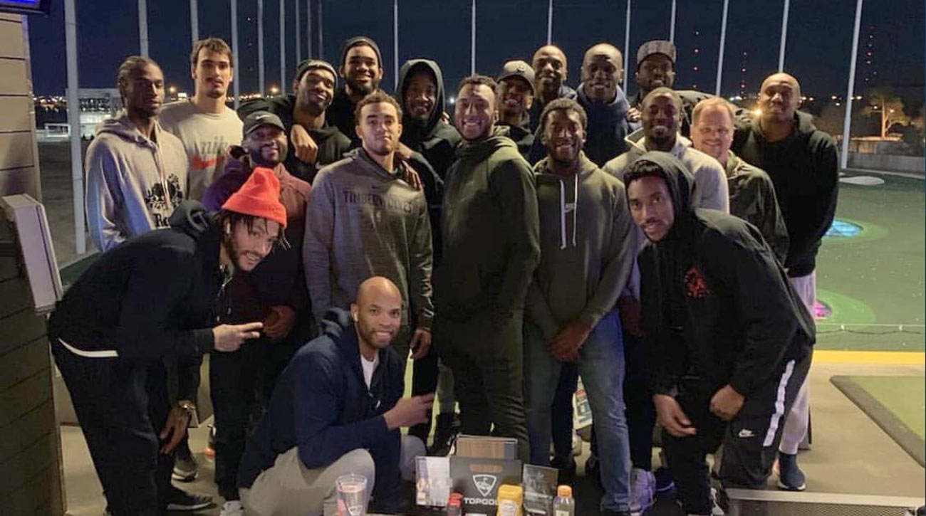 The Minnesota Timberwolves pose for a photo during a recent Topgolf outing.