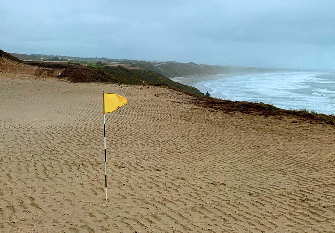 Here’s what it looks like when you stand on the 16th green and look back toward its tee box.