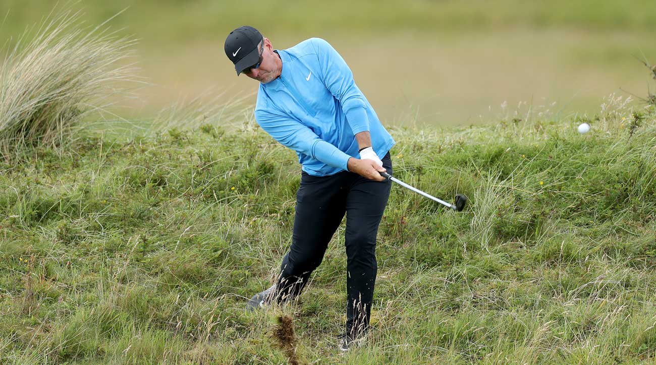 David duval hits a shot from the rough during the first round of the Open Championship at Royal Portrush.