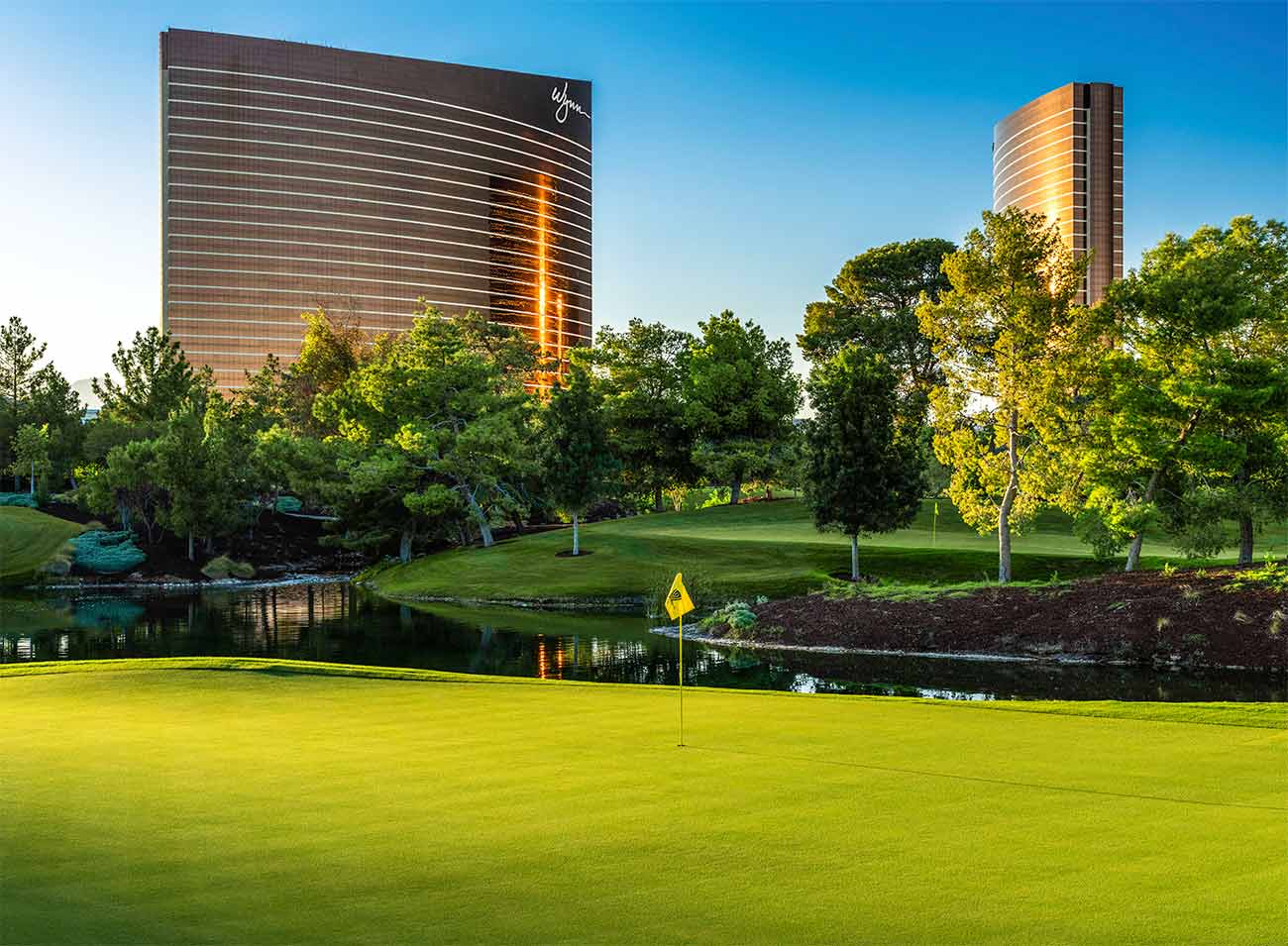 The 12th hole at Wynn Golf Club (with the Strip in the background).
