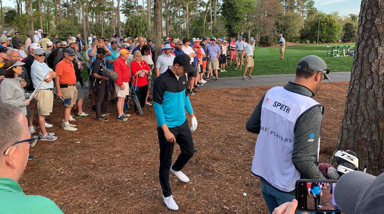 Jordan Spieth fired his opening tee shot into the woods to the right of No. 10.