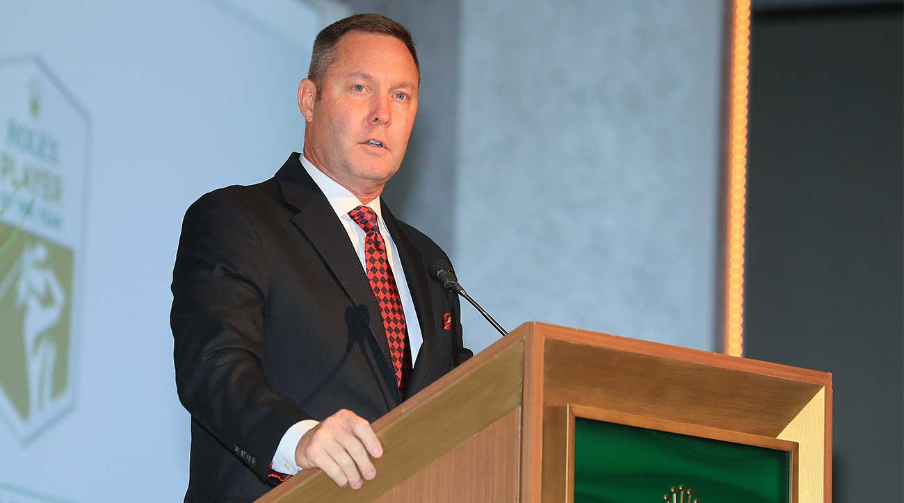 Michael Whan speaks to a crowd.