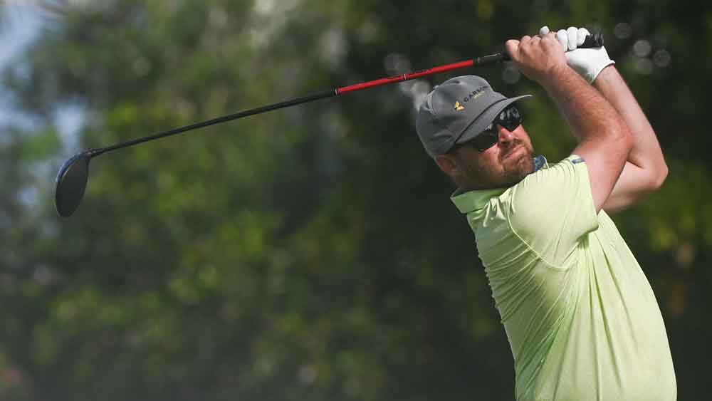 Brady Schnell tees off in a Korn Ferry Tour event earlier this year.