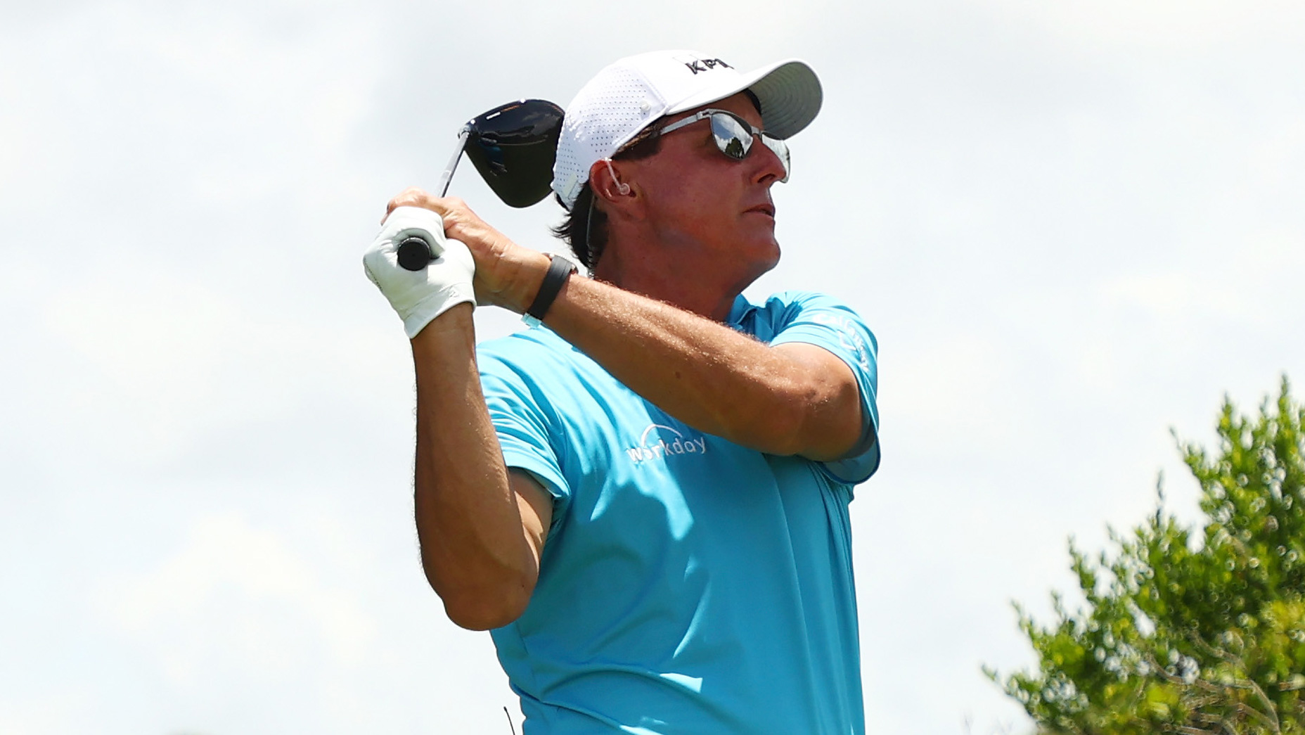 Phil Mickelson hits a tee shot during his practice round on Saturday.
