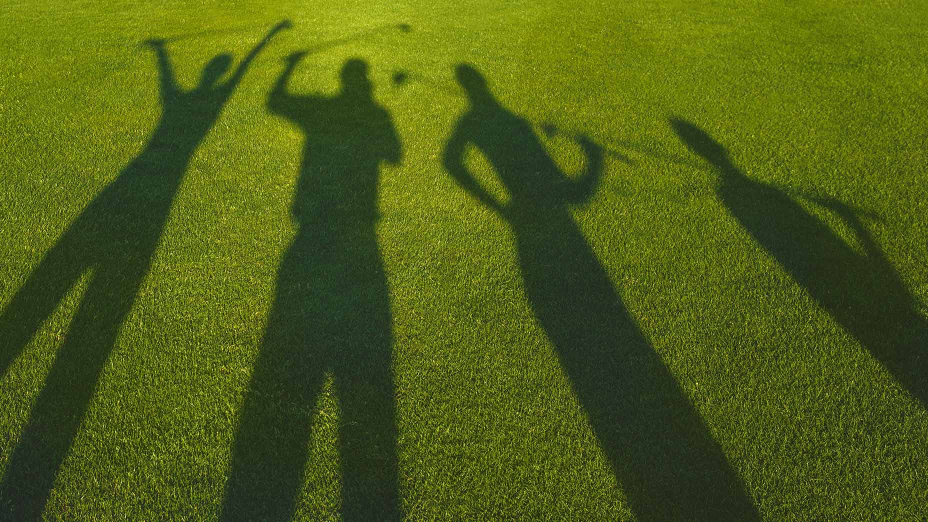 Shadow of golfers