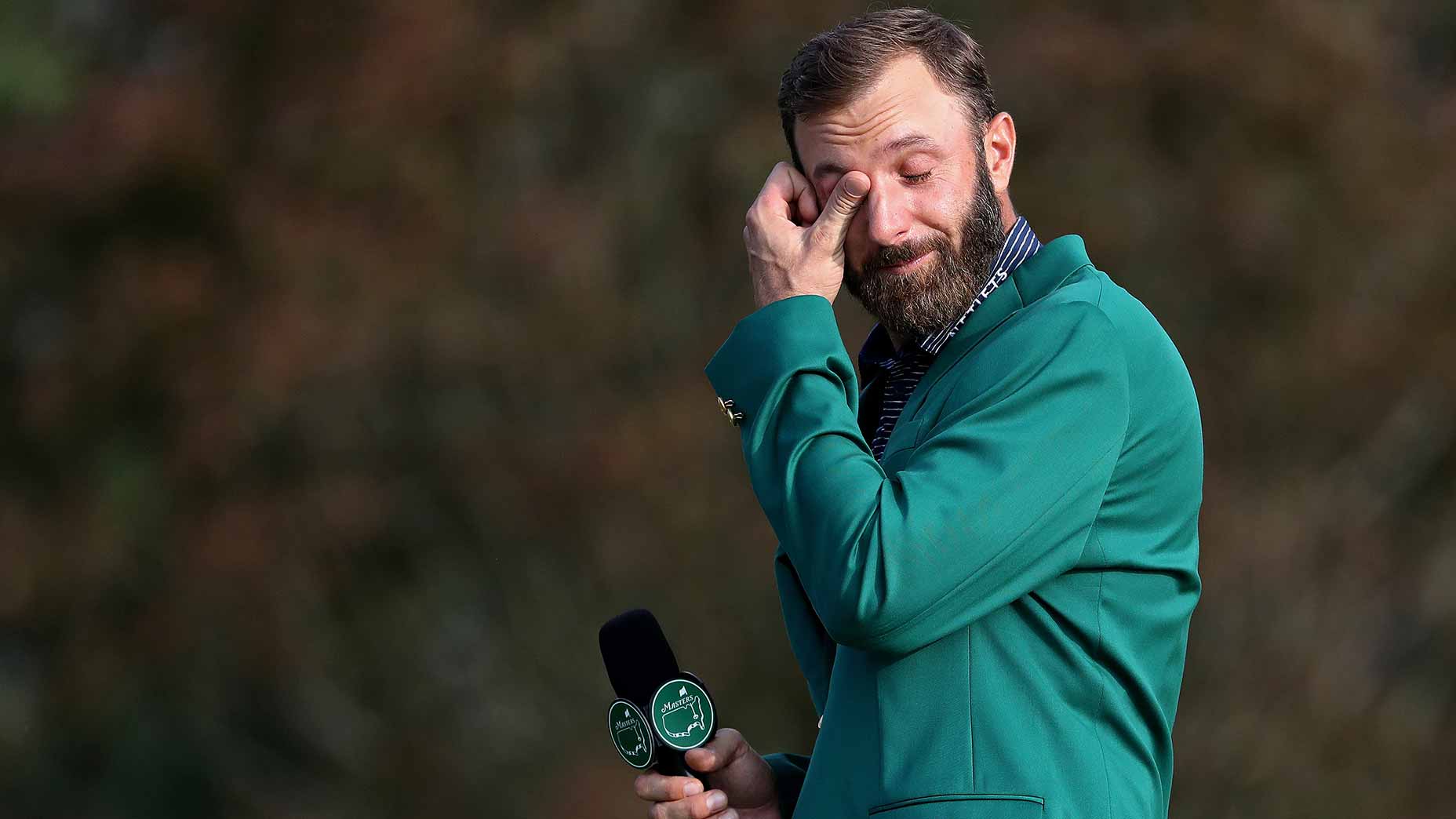 dustin johnson wipes tears