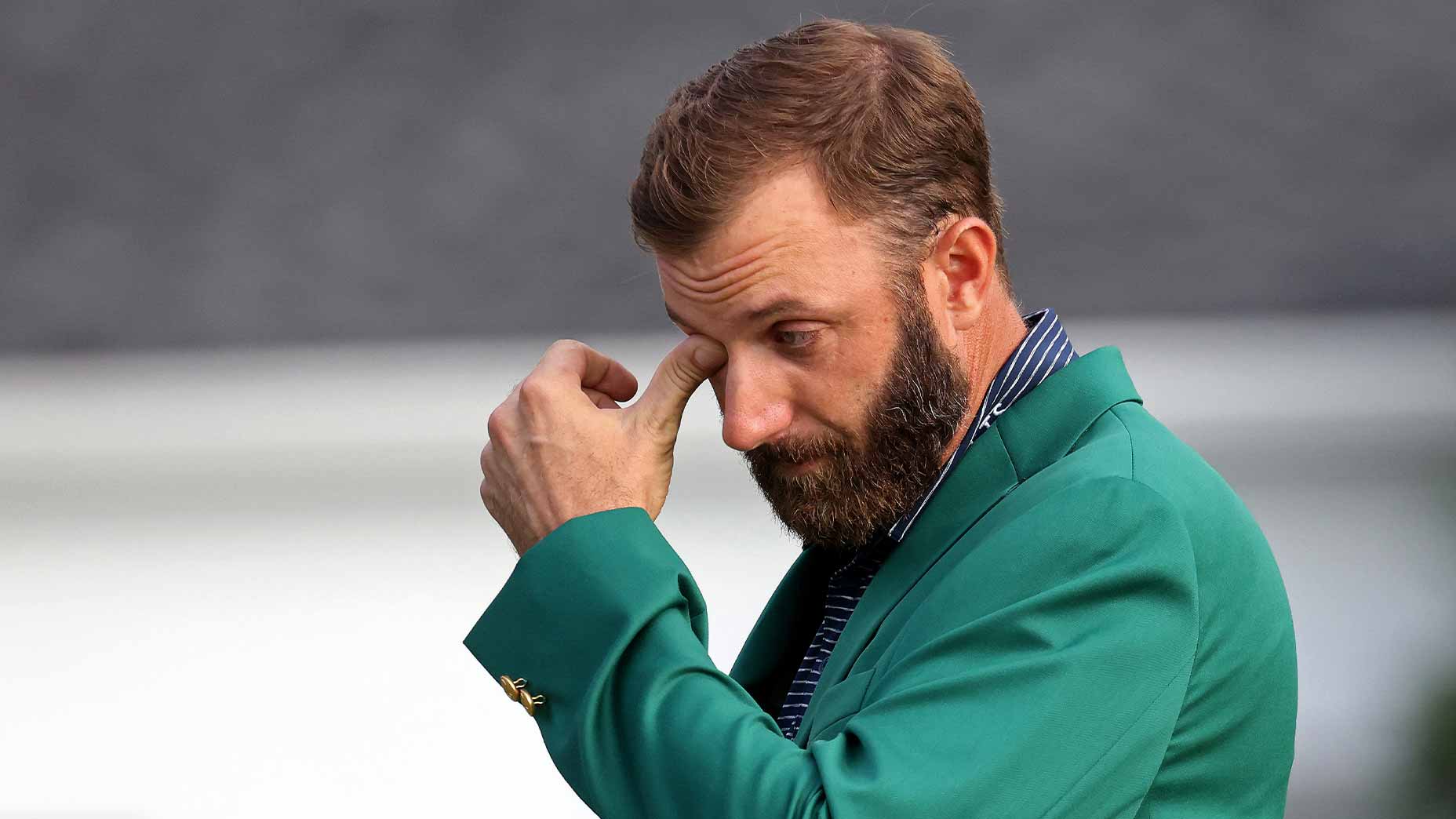 dustin johnson wipes tears