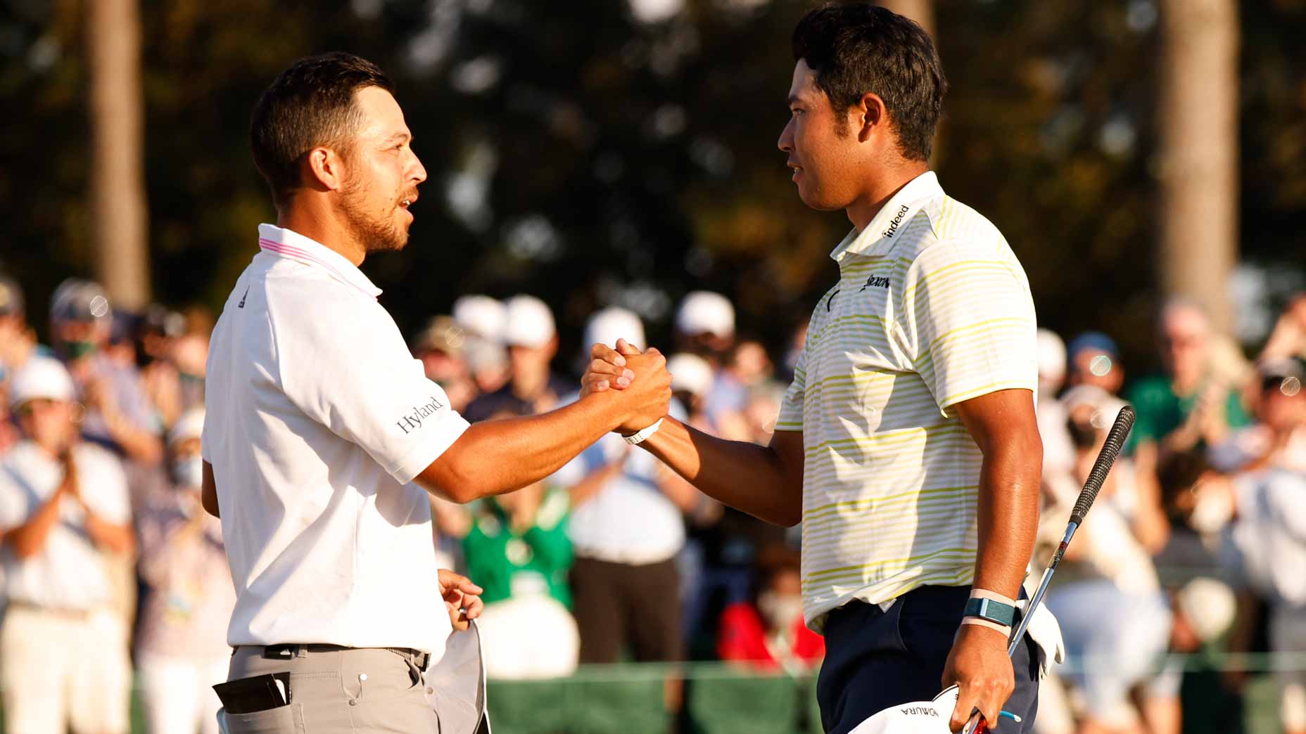 xnader and hideki embrace