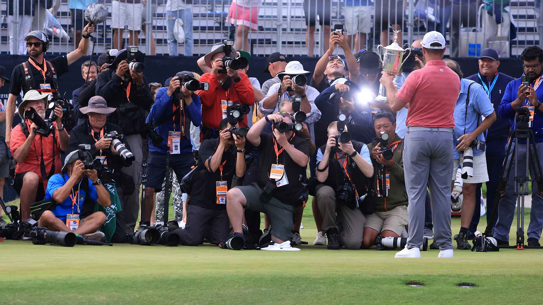 jon rahm poses photographs