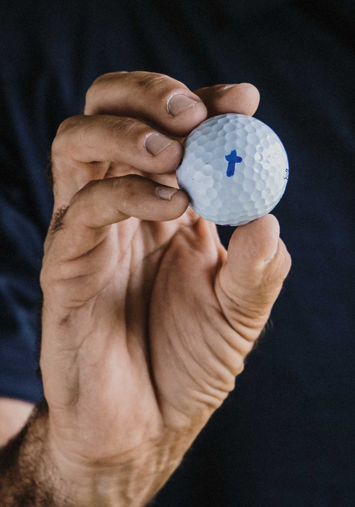 Stewart Cink&rsquo;s rock: A Titleist marked with a cross.