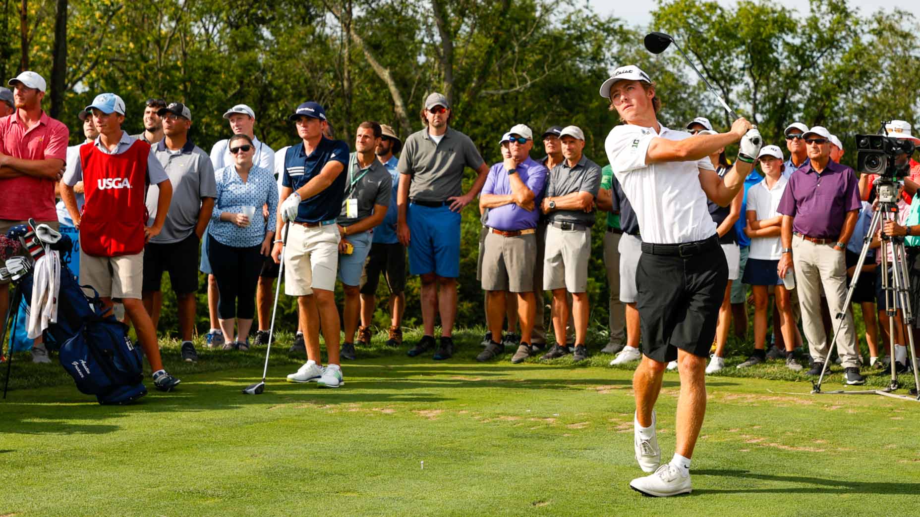 James Point hits a tee shot