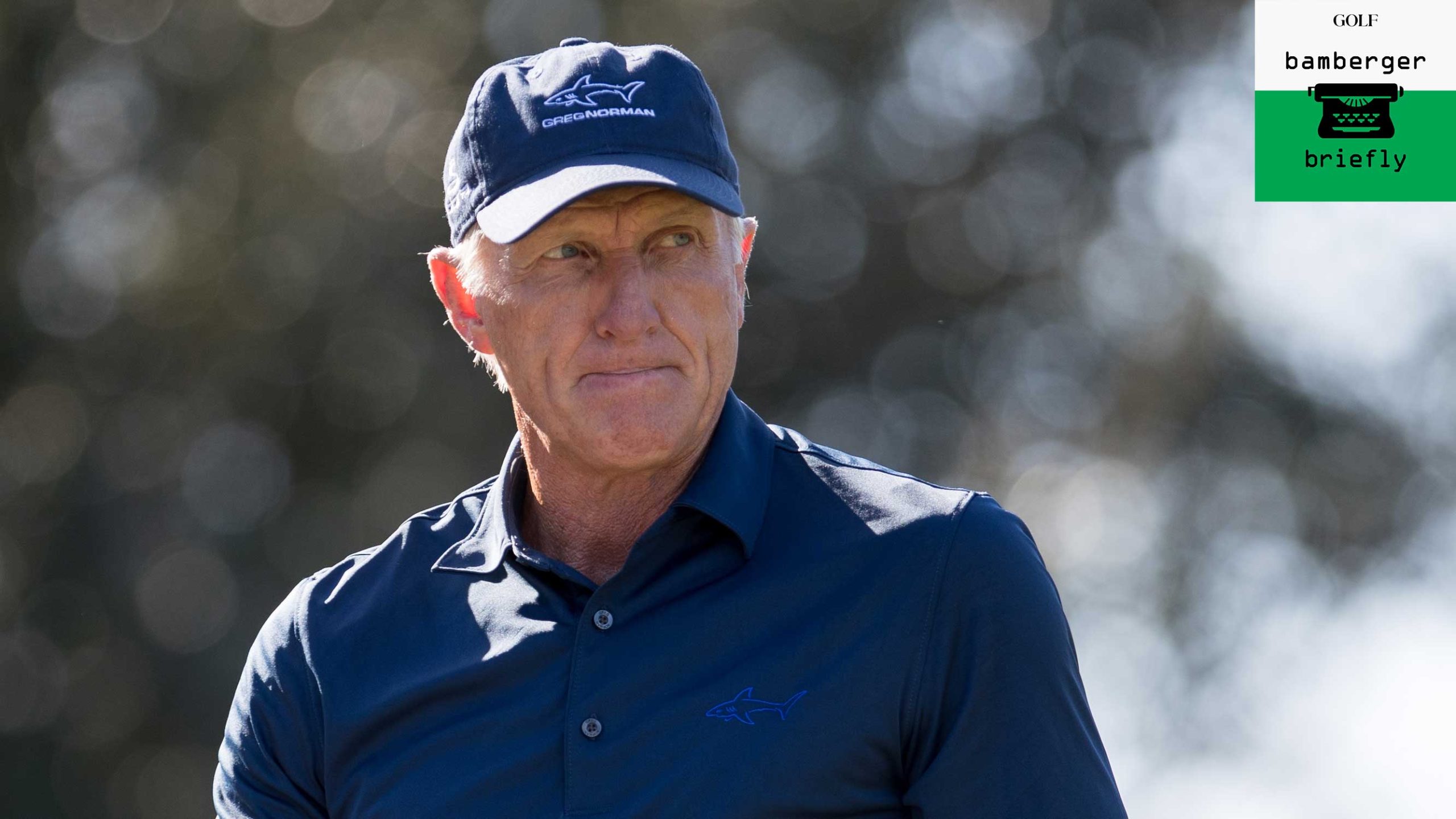 greg norman walking down a fairway