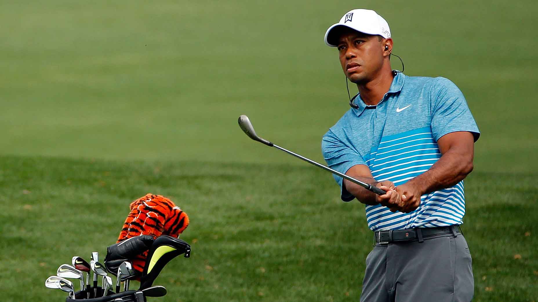 Tiger Woods hits a wedge