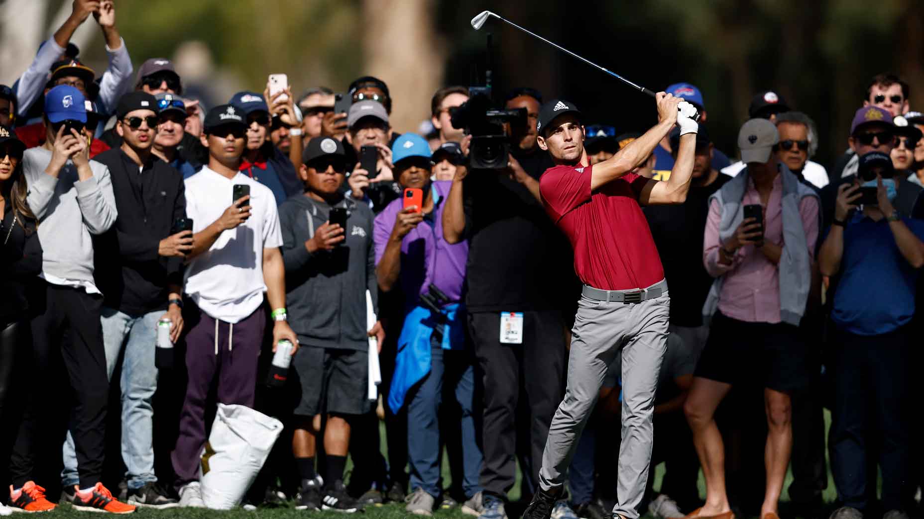 joaquin niemann swings a club