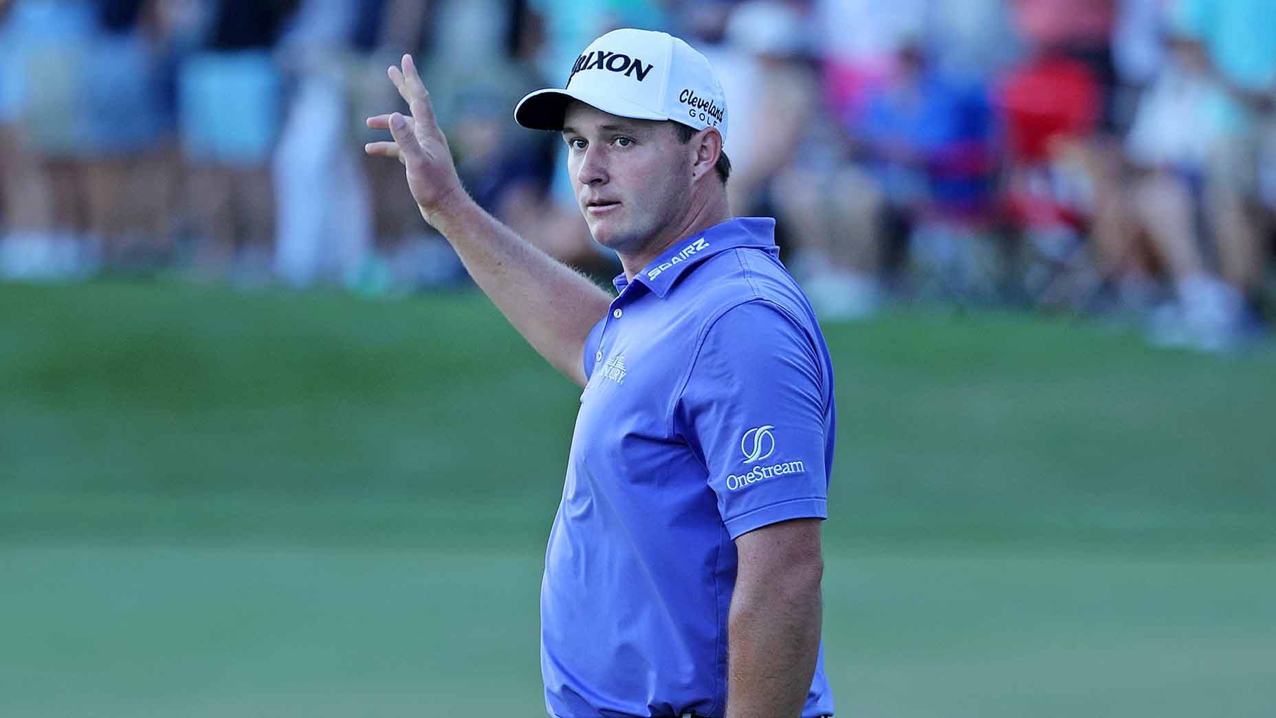 Sepp Straka waves to the crowd at The Honda Classic.