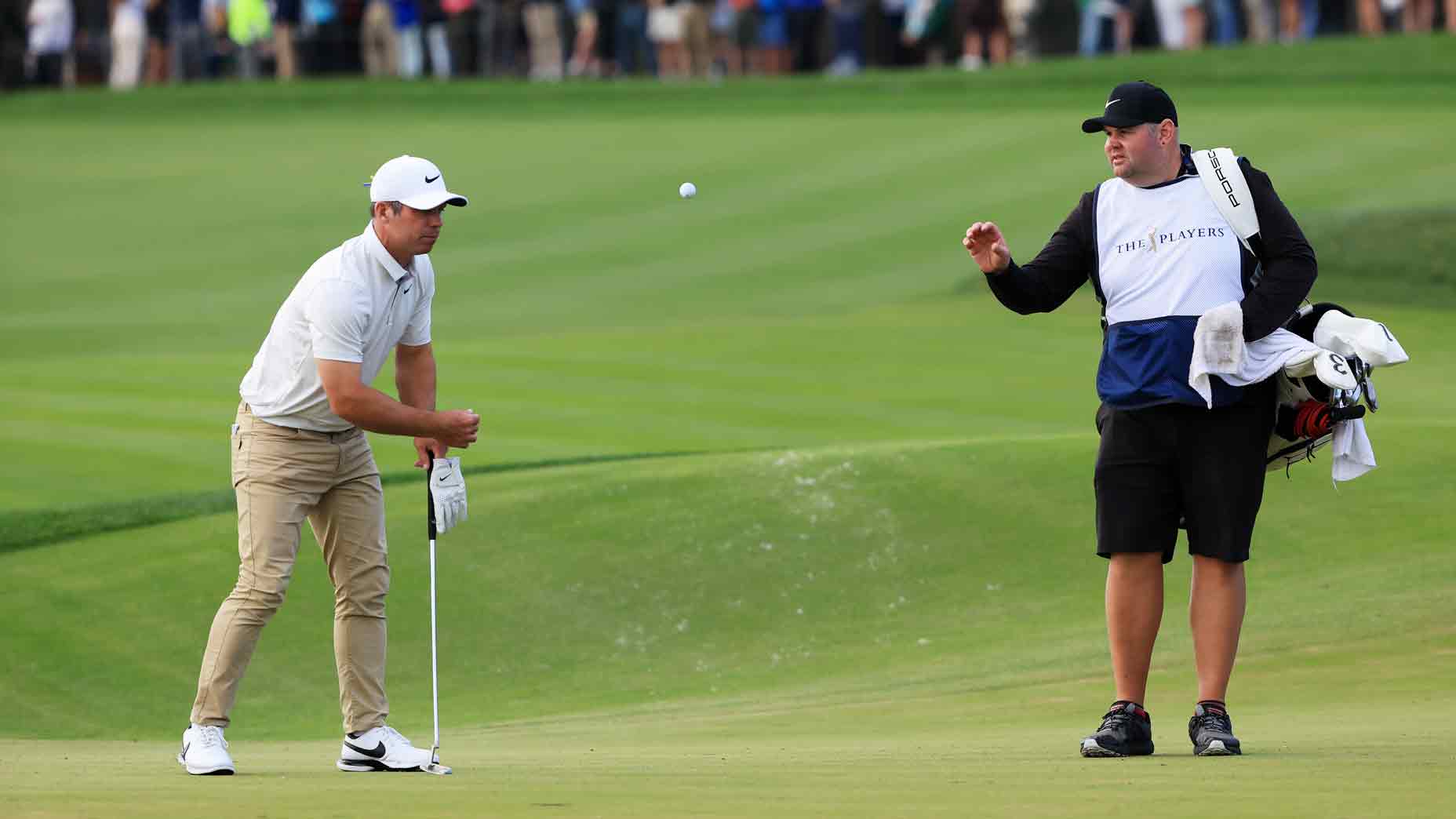 Paul Casey tosses ball