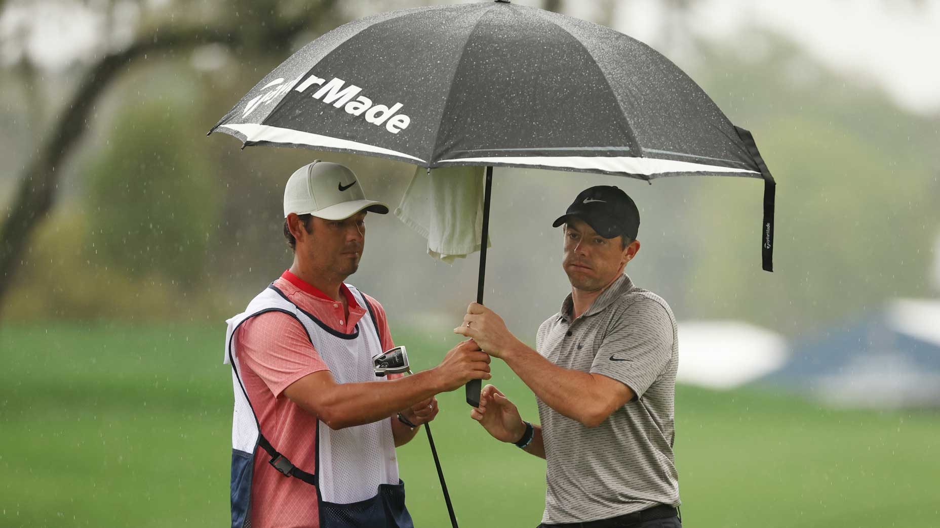 Rory McIlroy, battling the elements.