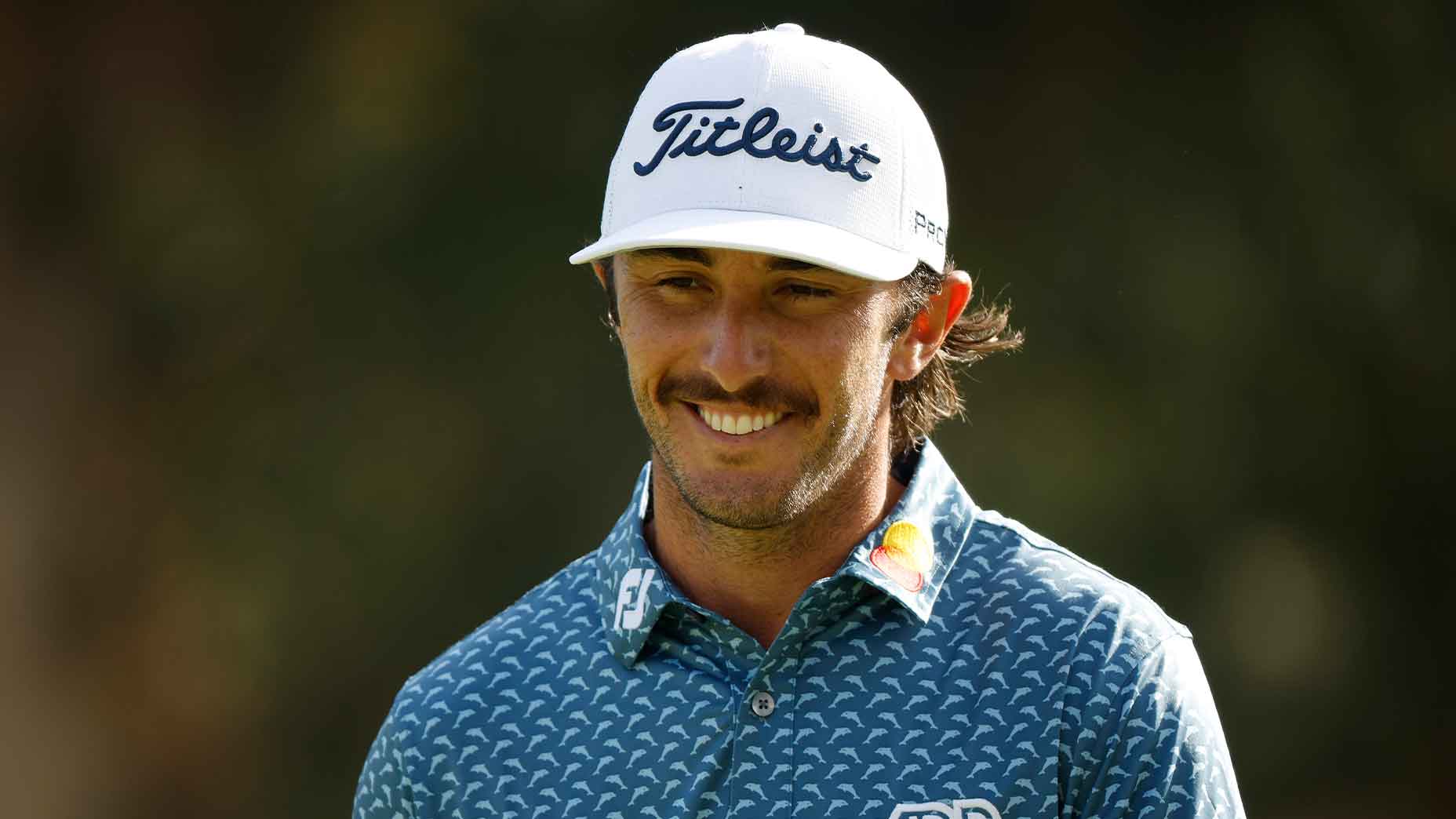 max homa smiles at camera