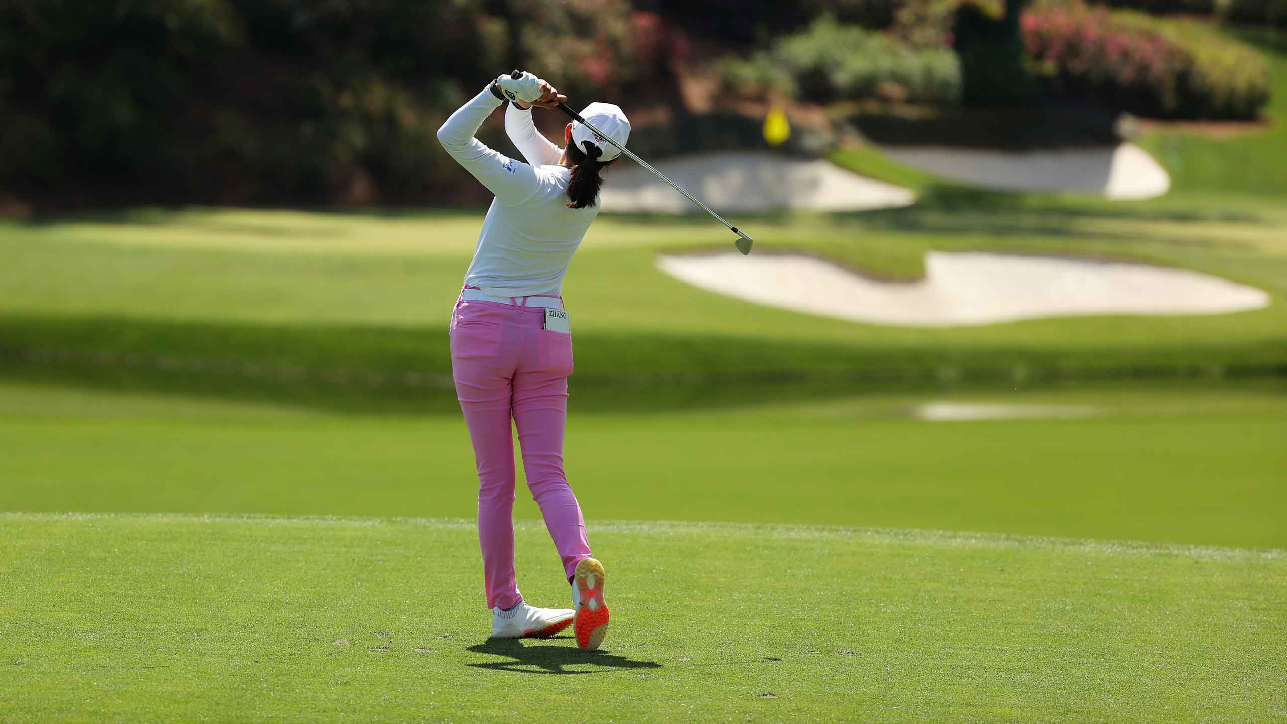 rose zhang hits shot on no. 12 at augusta national
