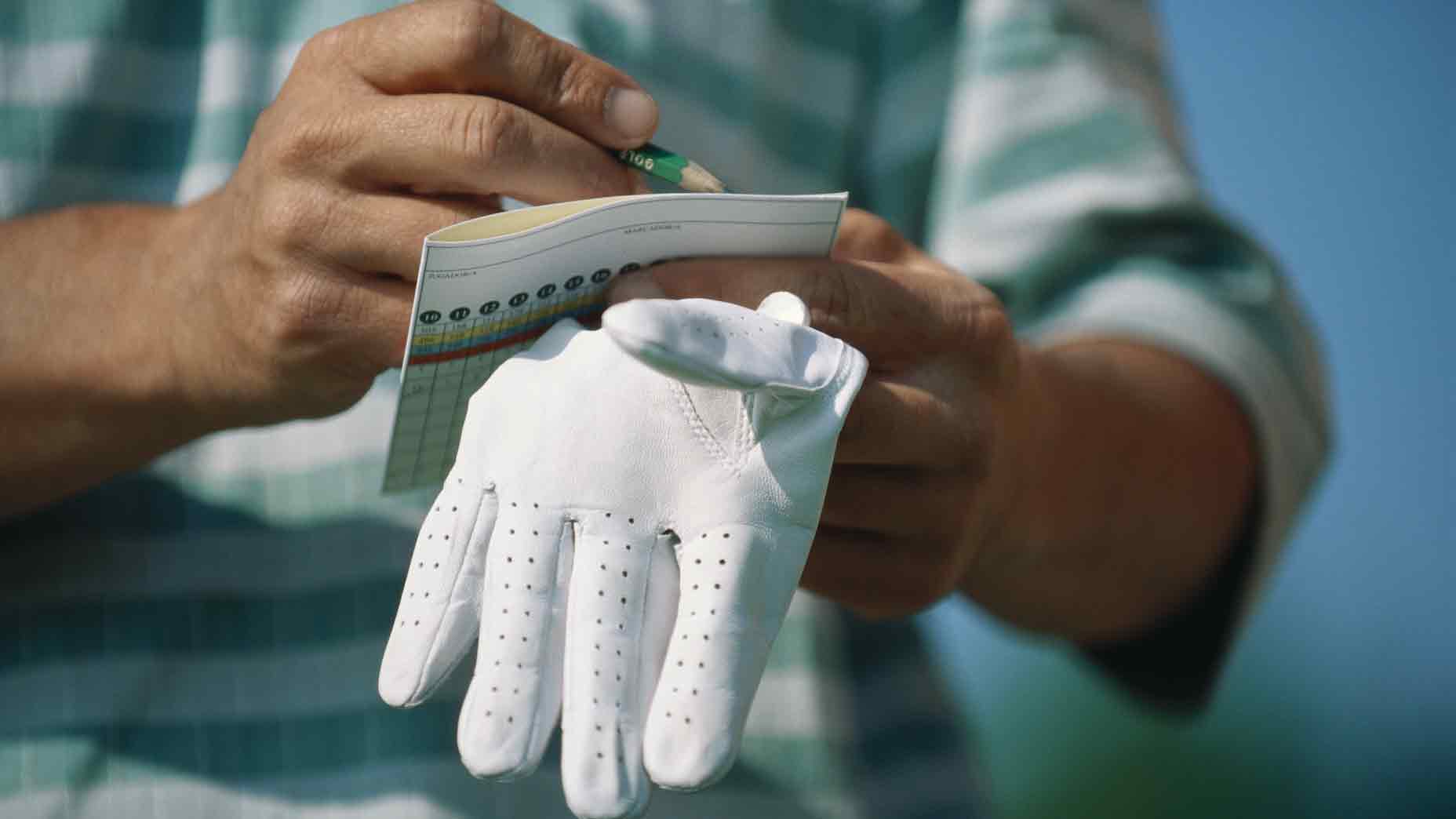 golfer with scorecard