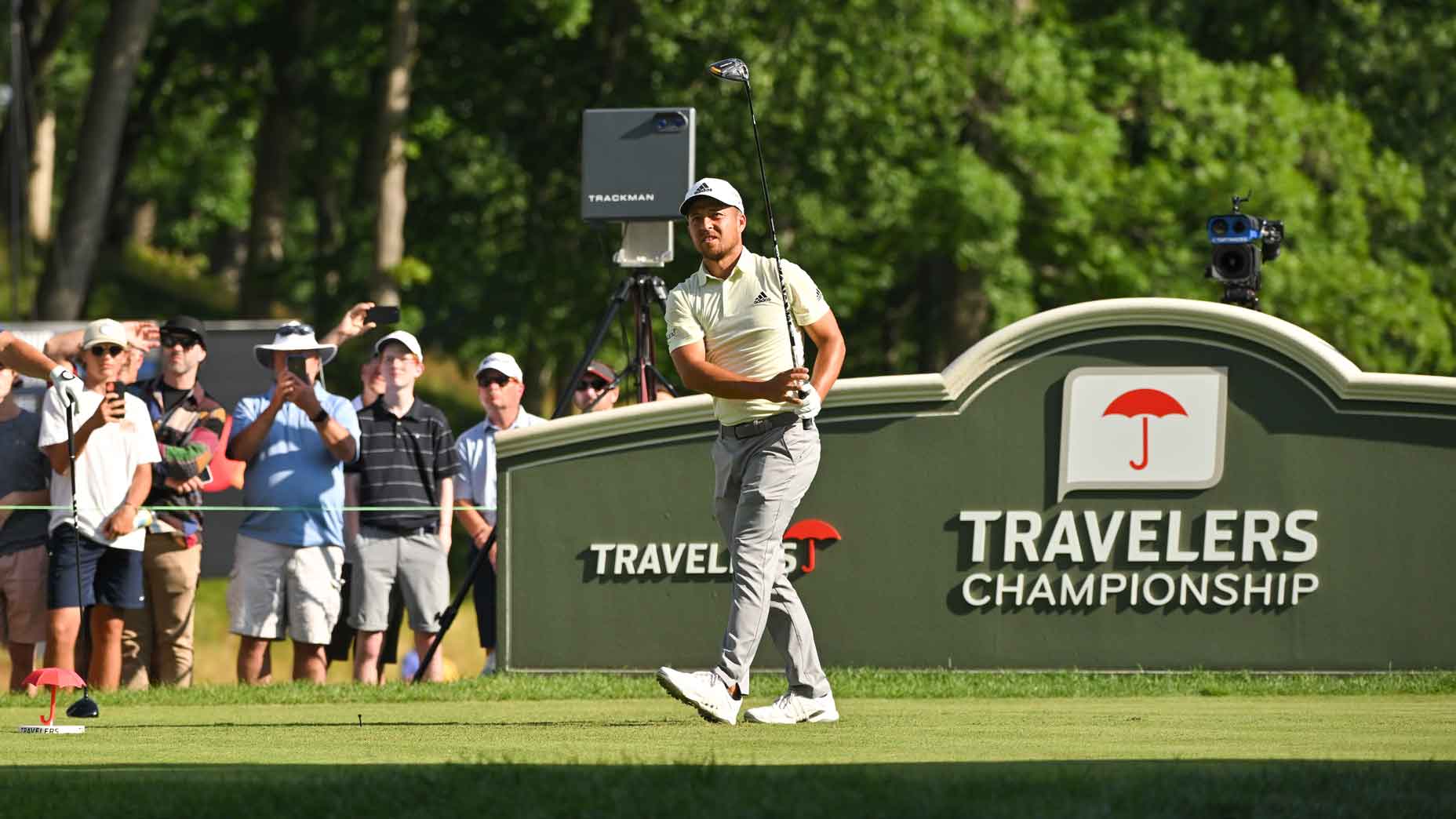 Xander Schauffele tees off during 2022 Travelers Championship