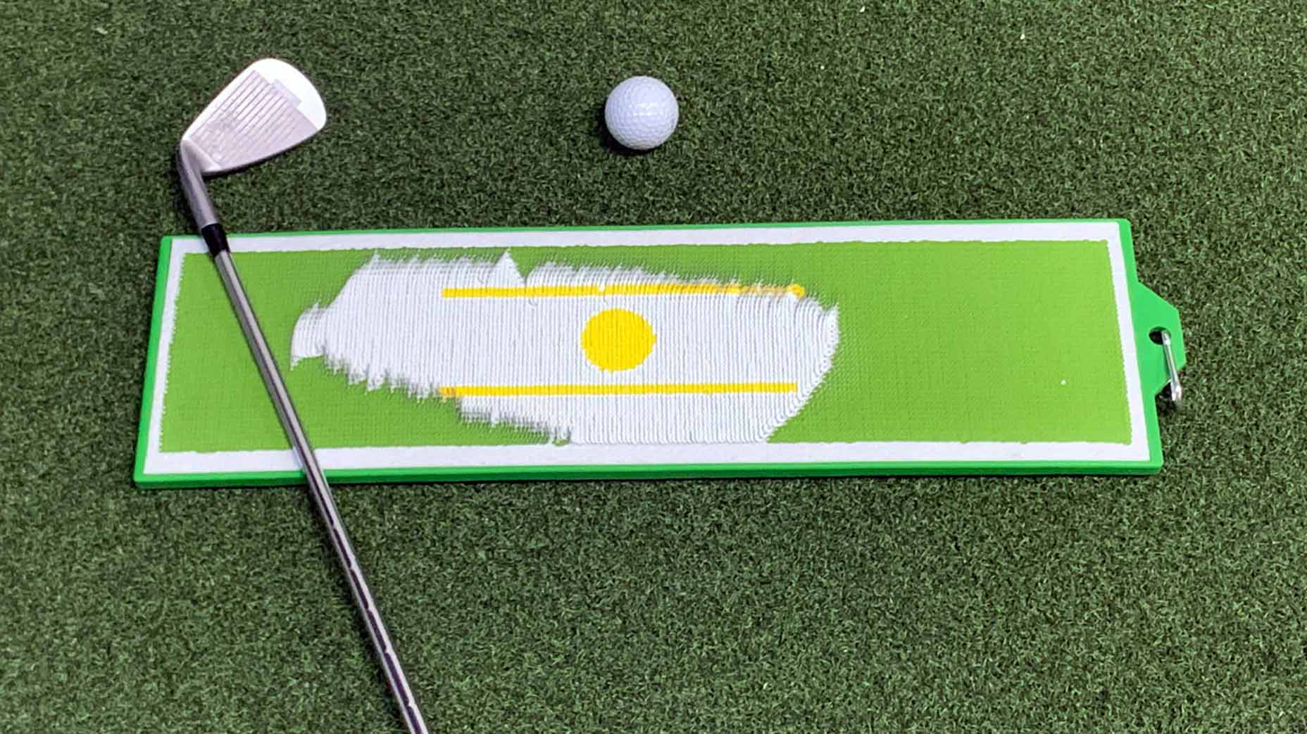 Divot board golf swing trainer