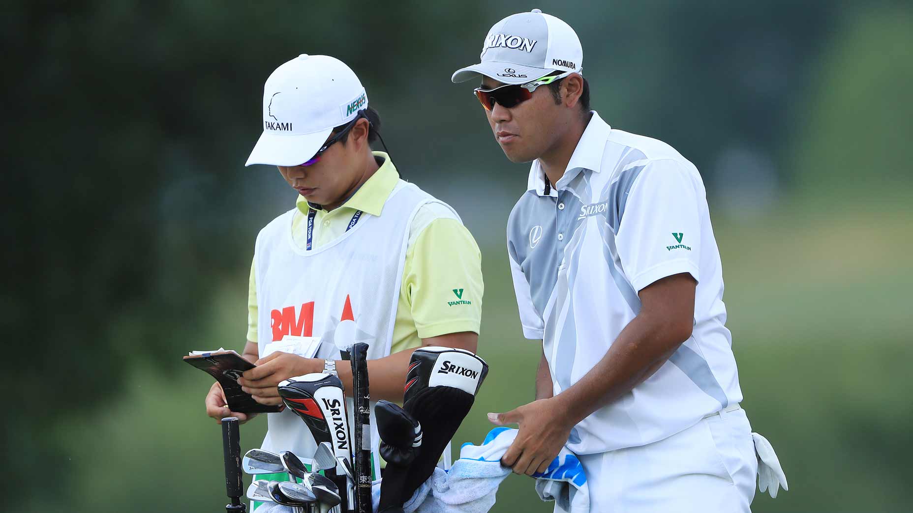 Hideki Matsuyama talks with caddie at 2019 3M Open