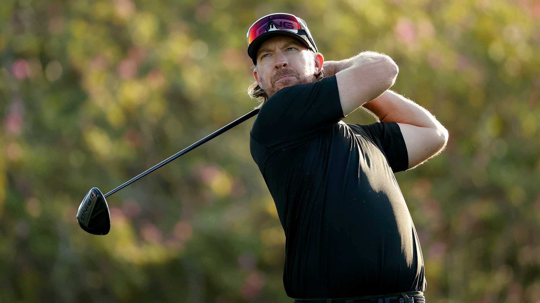 Hunter Mahan watches a shot.