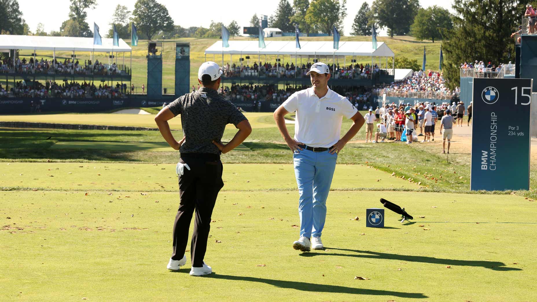 Patrick Cantlay and Xander Schauffele look at each other at the BMW Championship