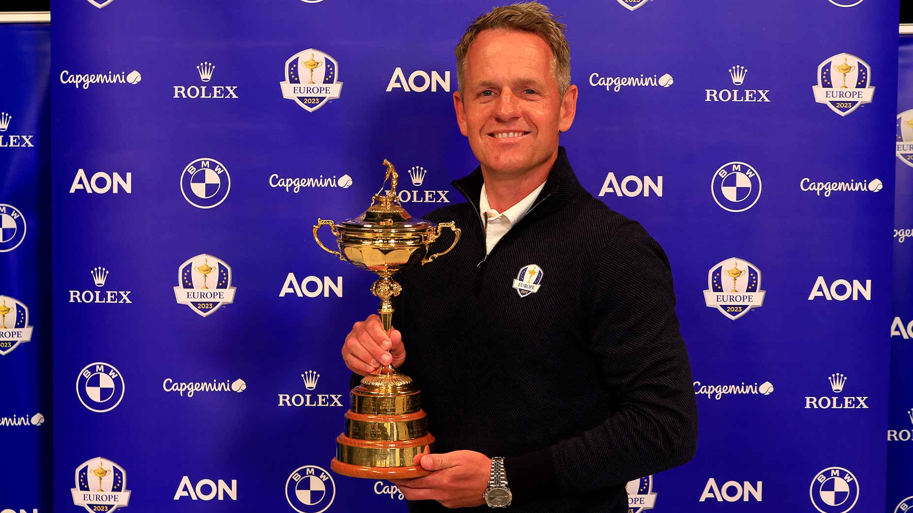 luke donald holds ryder cup trophy