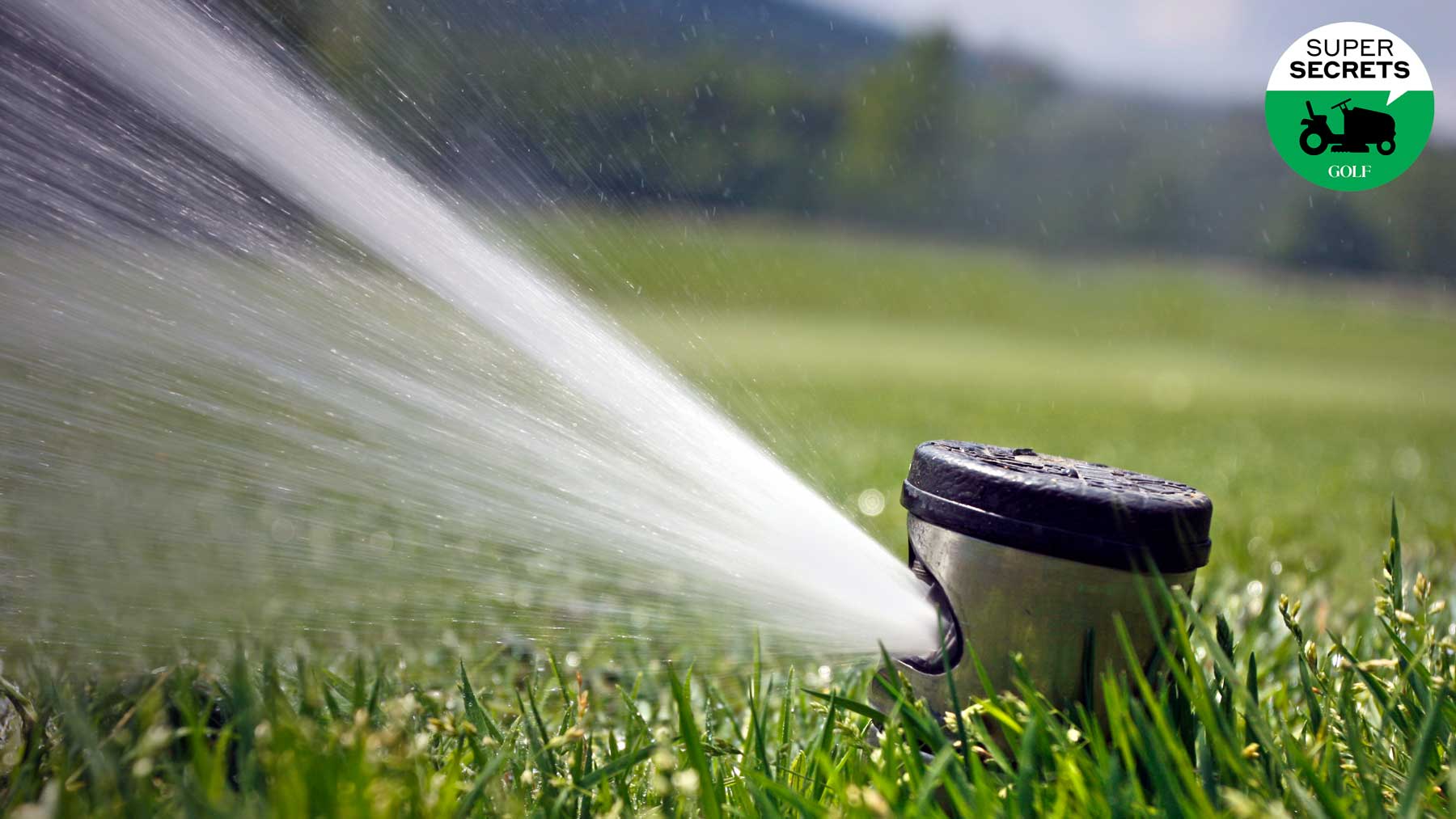 a sprinkler system on a golf course