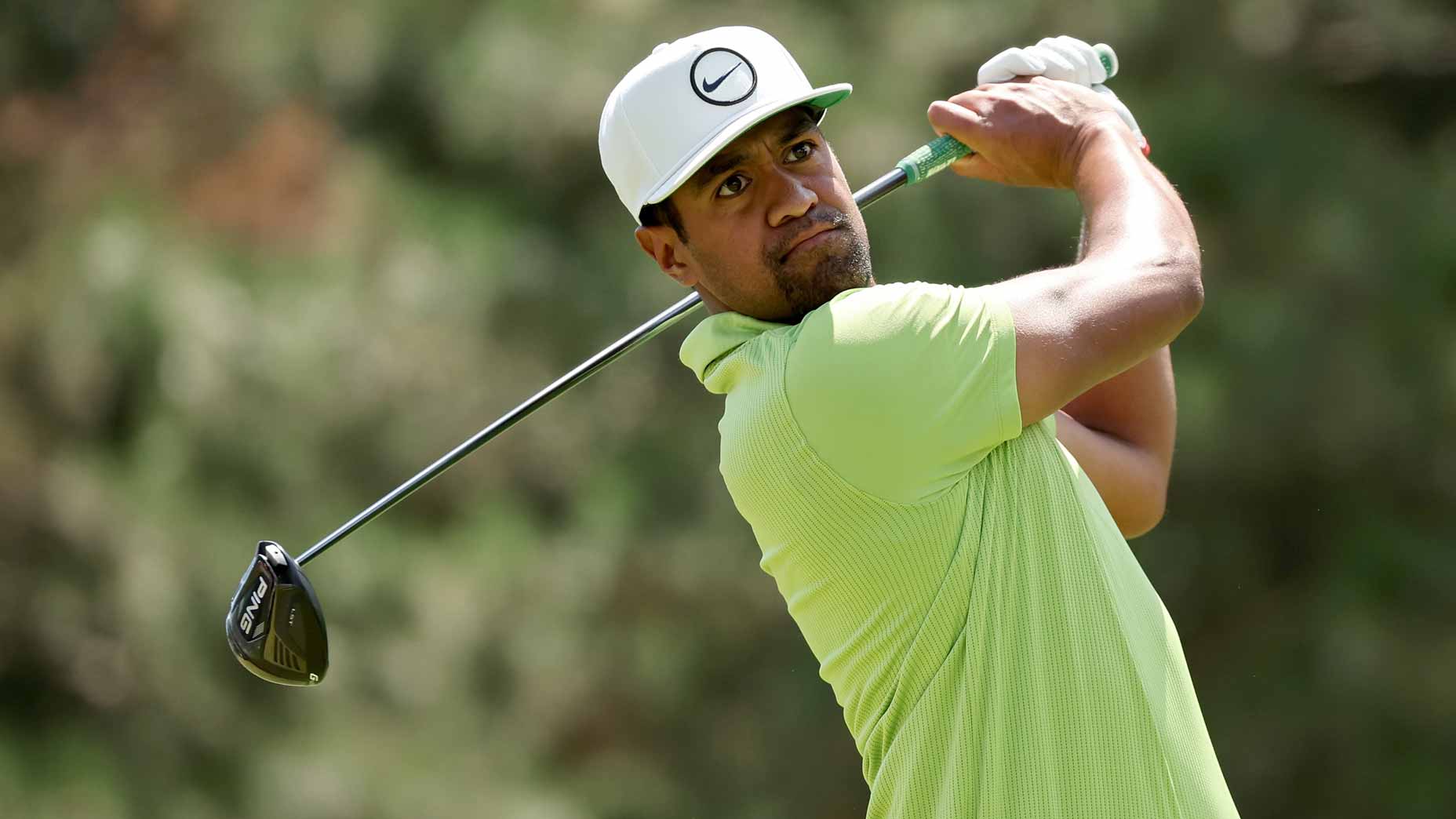Tony Finau hits tee shot during 2022 Rocket Mortgage Classic