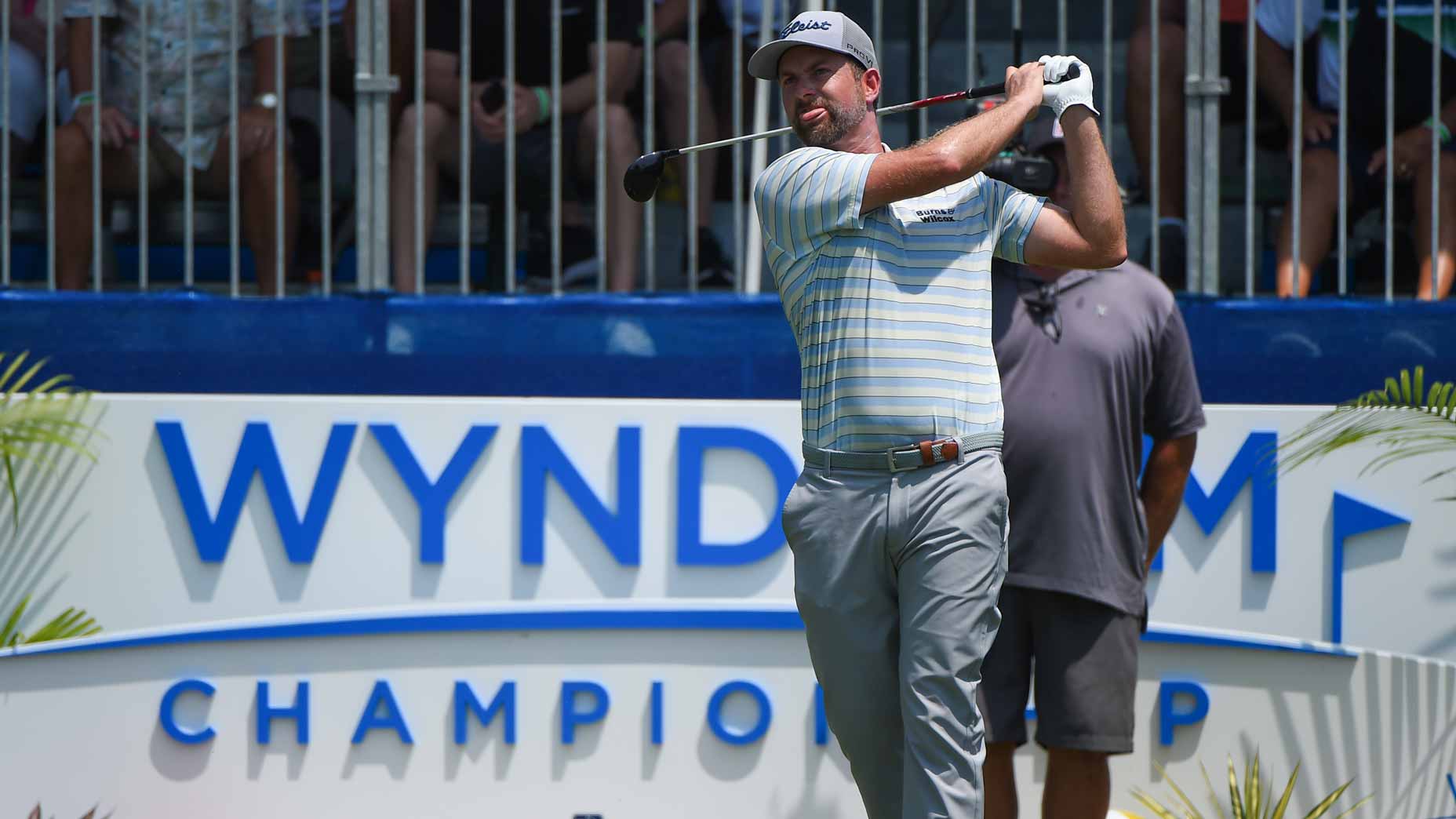 Webb Simpson watches tee shot at 2022 Wyndham Championship
