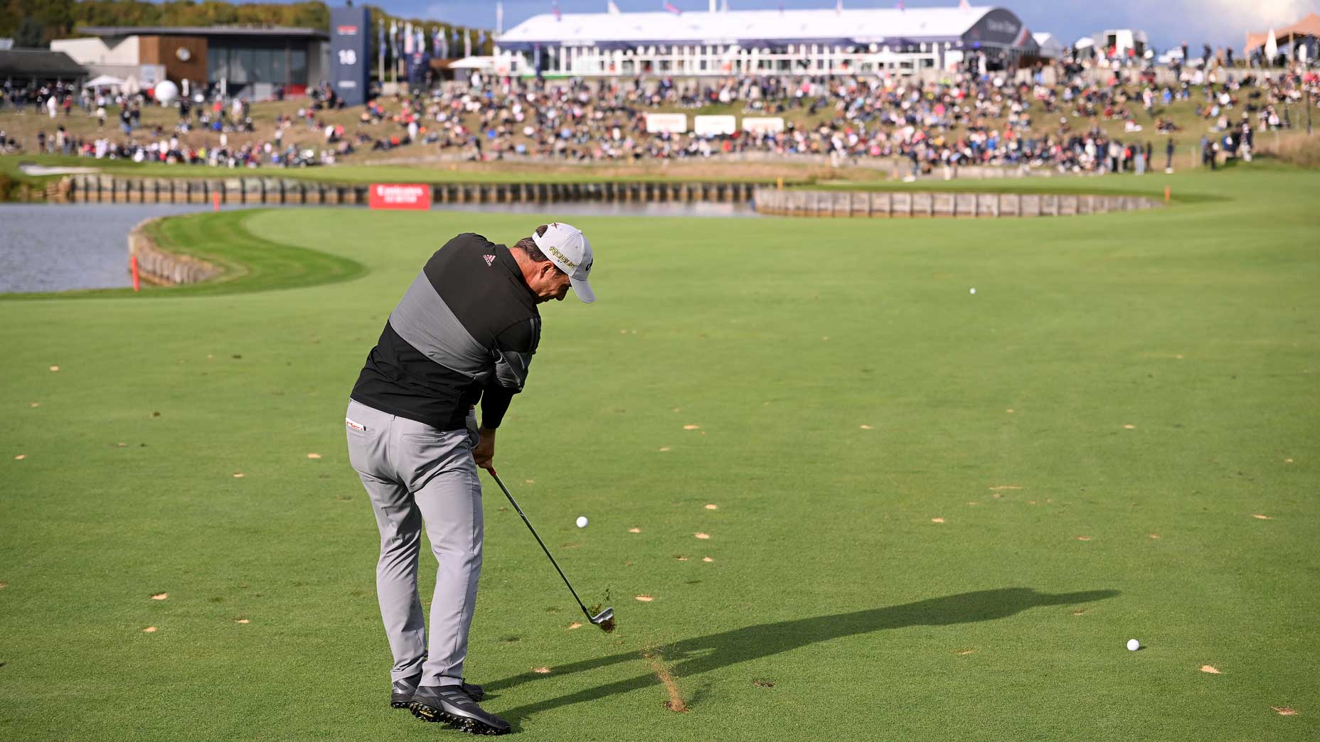 Guido Migliozzi of Italy plays his second shot on the 18th hole on Day Four of the Cazoo Open de France at Le Golf National on September 25, 2022 in Paris, France.