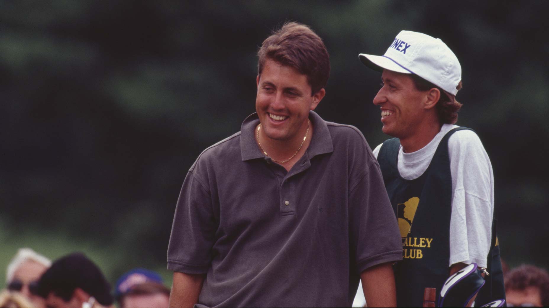 Phil Mickelson smiles with Jim "Bones" Mackay at the 1992 New England Classic.
