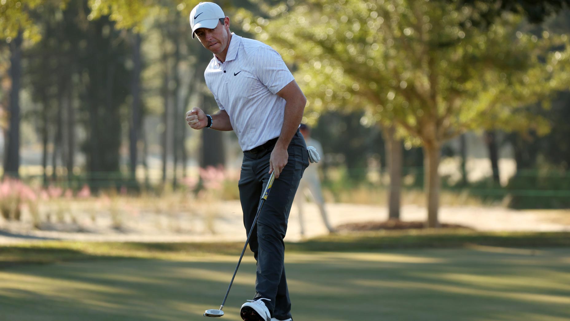Rory McIlroy of Northern Ireland reacts to his birdie putt on the 16th green during the final round of the CJ Cup at Congaree Golf Club on October 23, 2022 in Ridgeland, South Carolina.