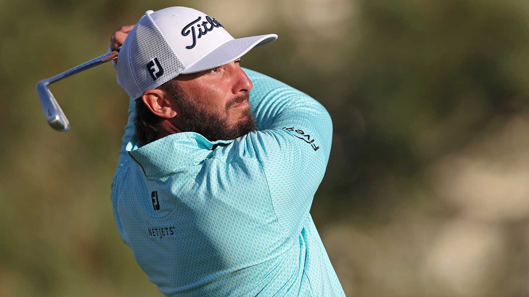 Max homa hits a shot at the farmers insurance open.