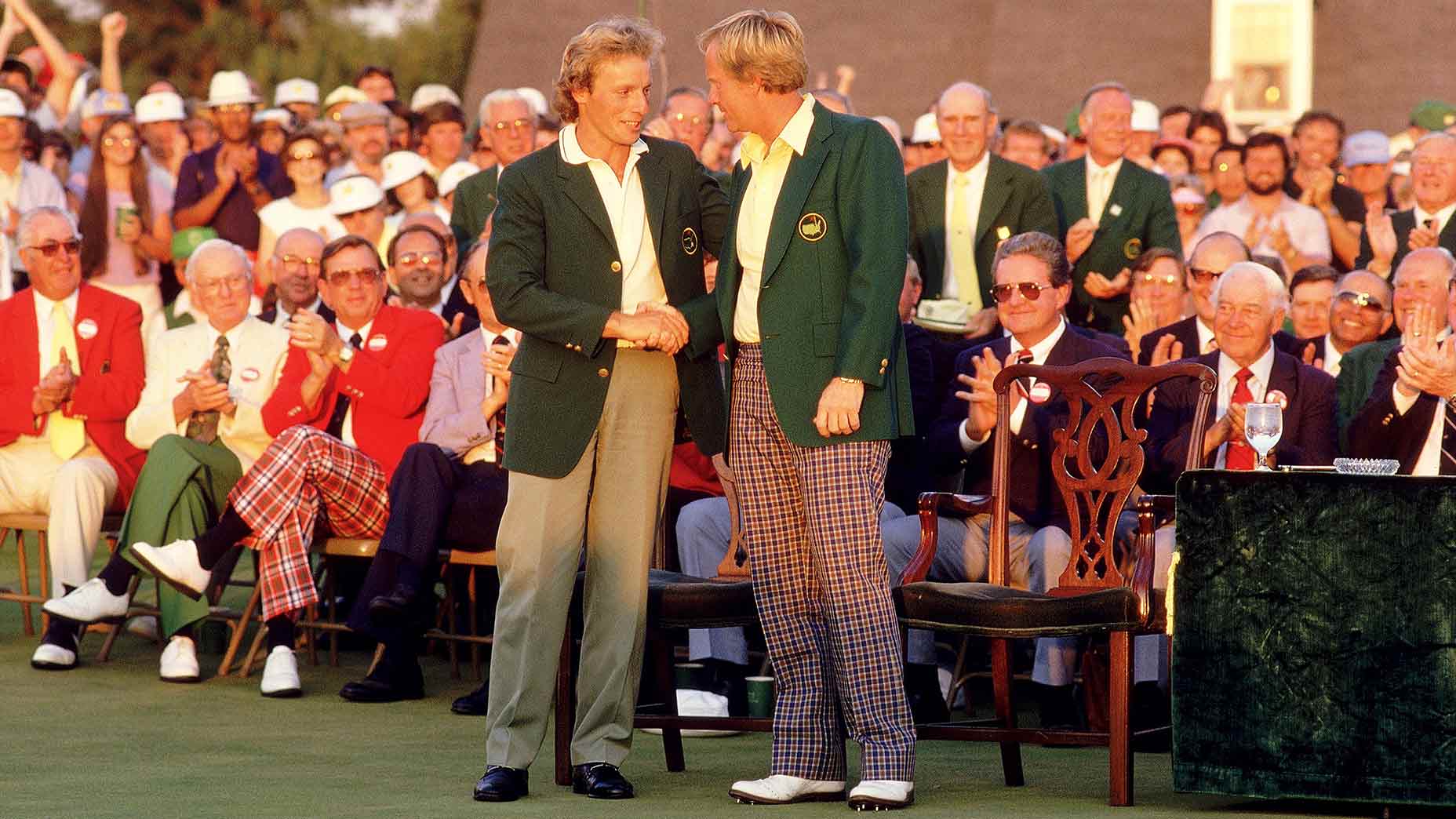 Jack Nicklaus receives the green jacket from Bernhard Langer at the 1986 Masters.