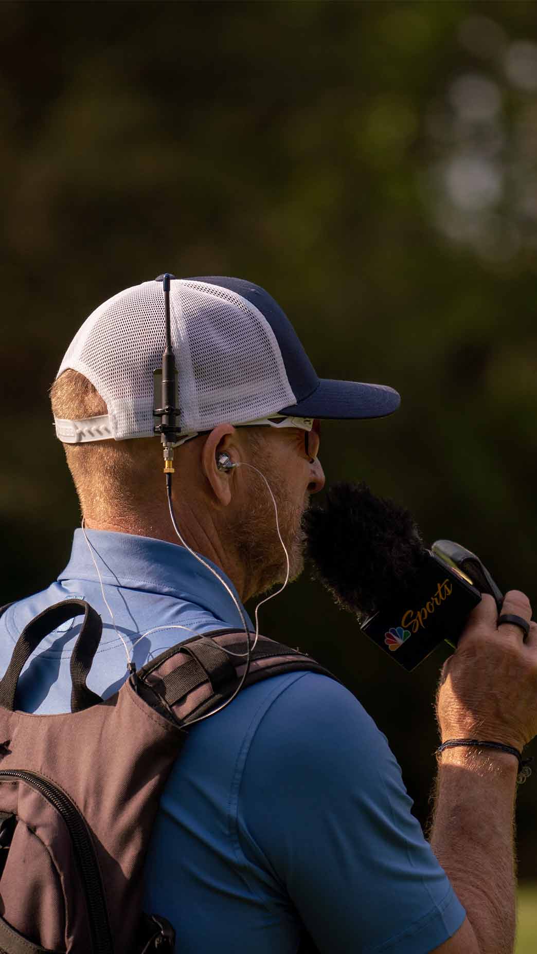 john wood speaks microphone