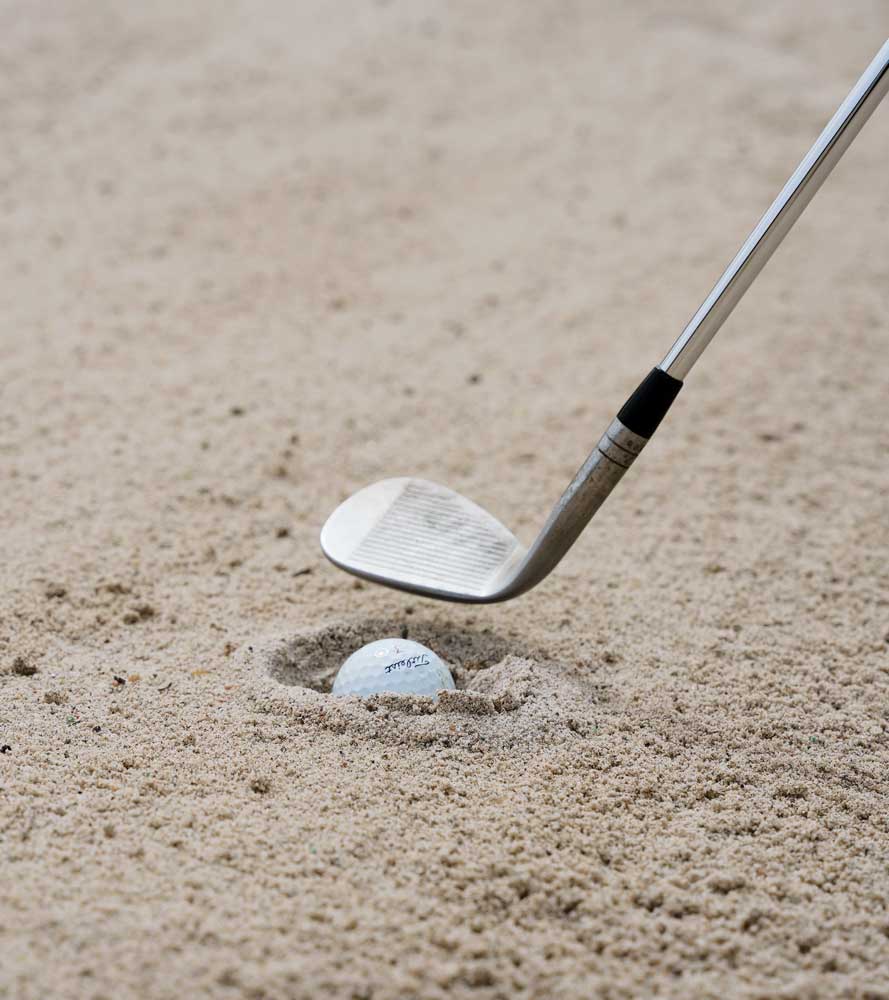 plugged ball in bunker