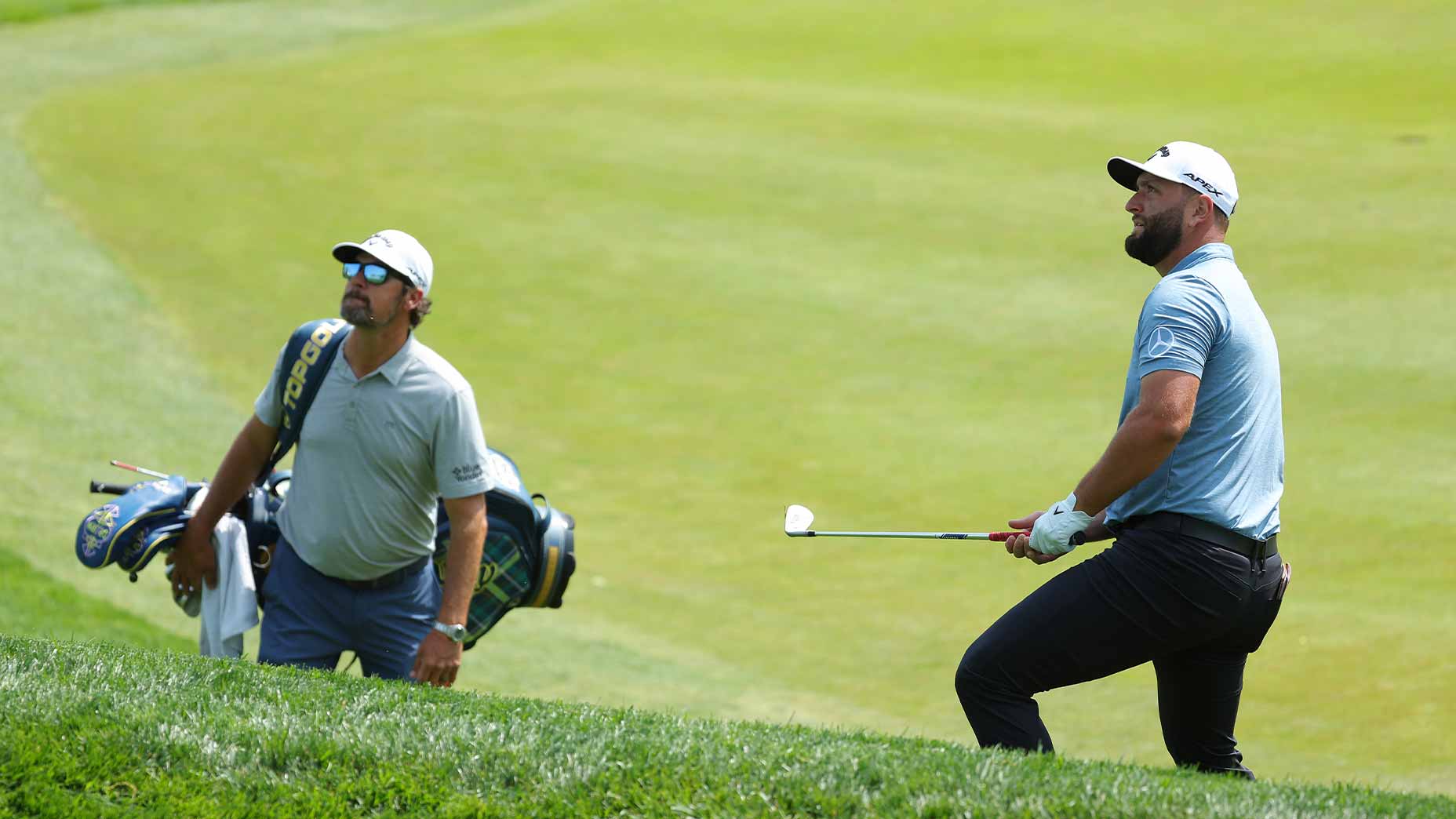 jon rahm and adam hayes play golf