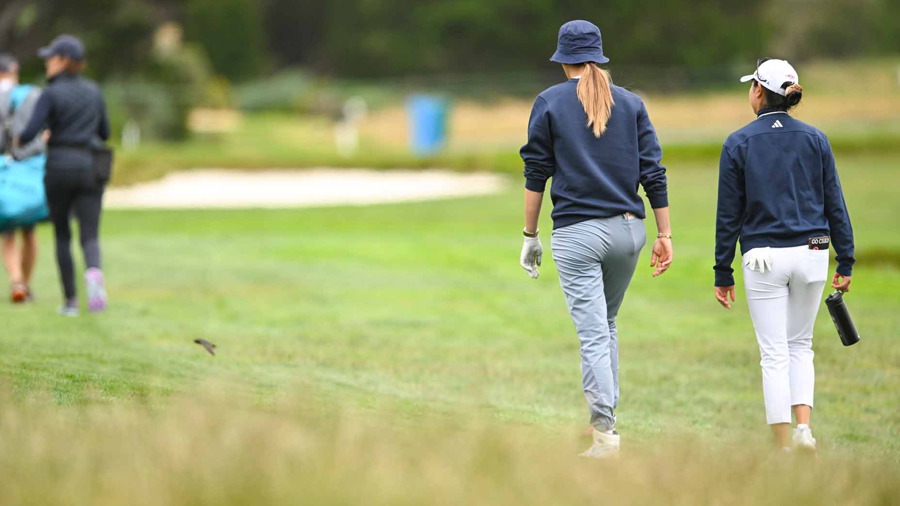 Michelle Wie West and Rose Zhang play a practice round ahead of the U.S. Women's Open.