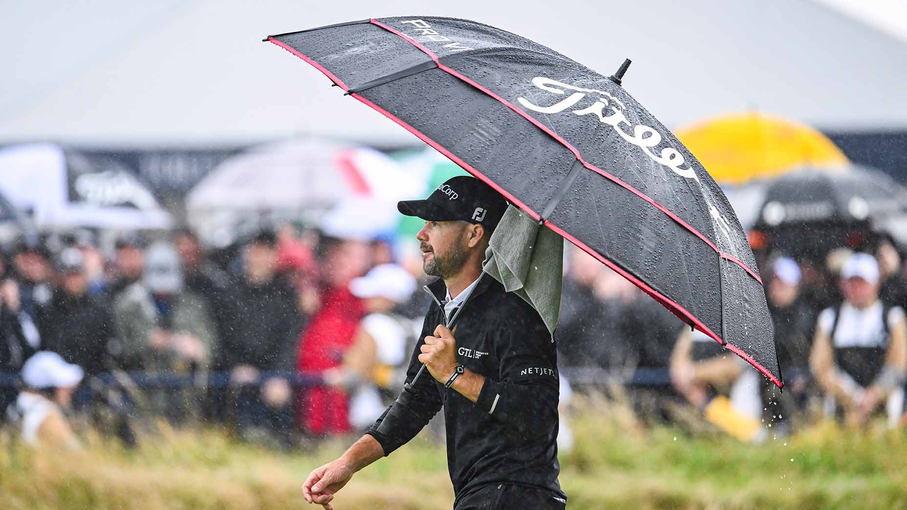 brian harman walks at the open championship