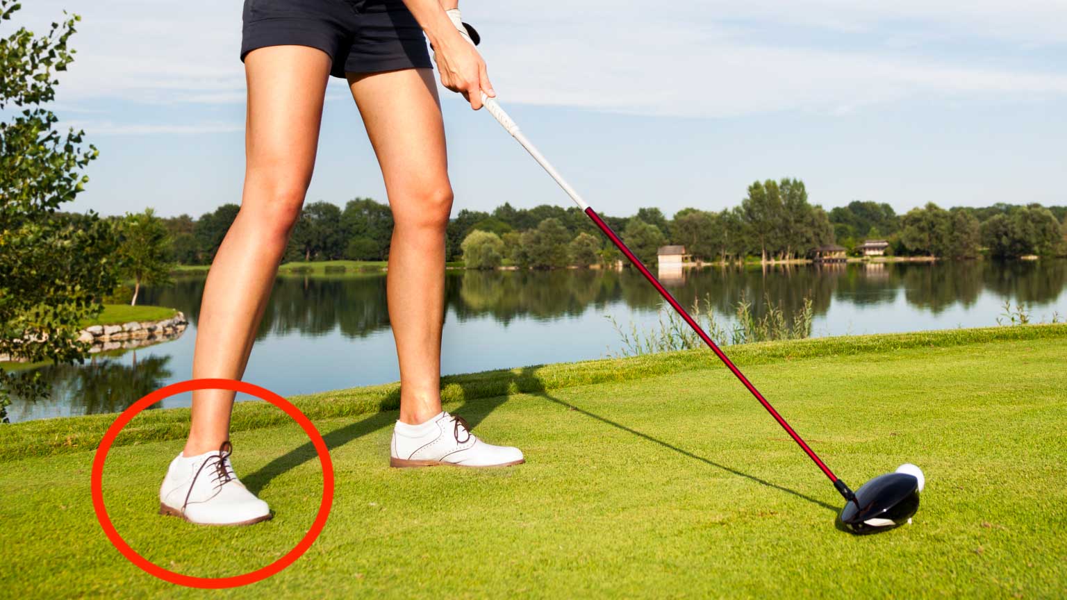 golfer at address with driver