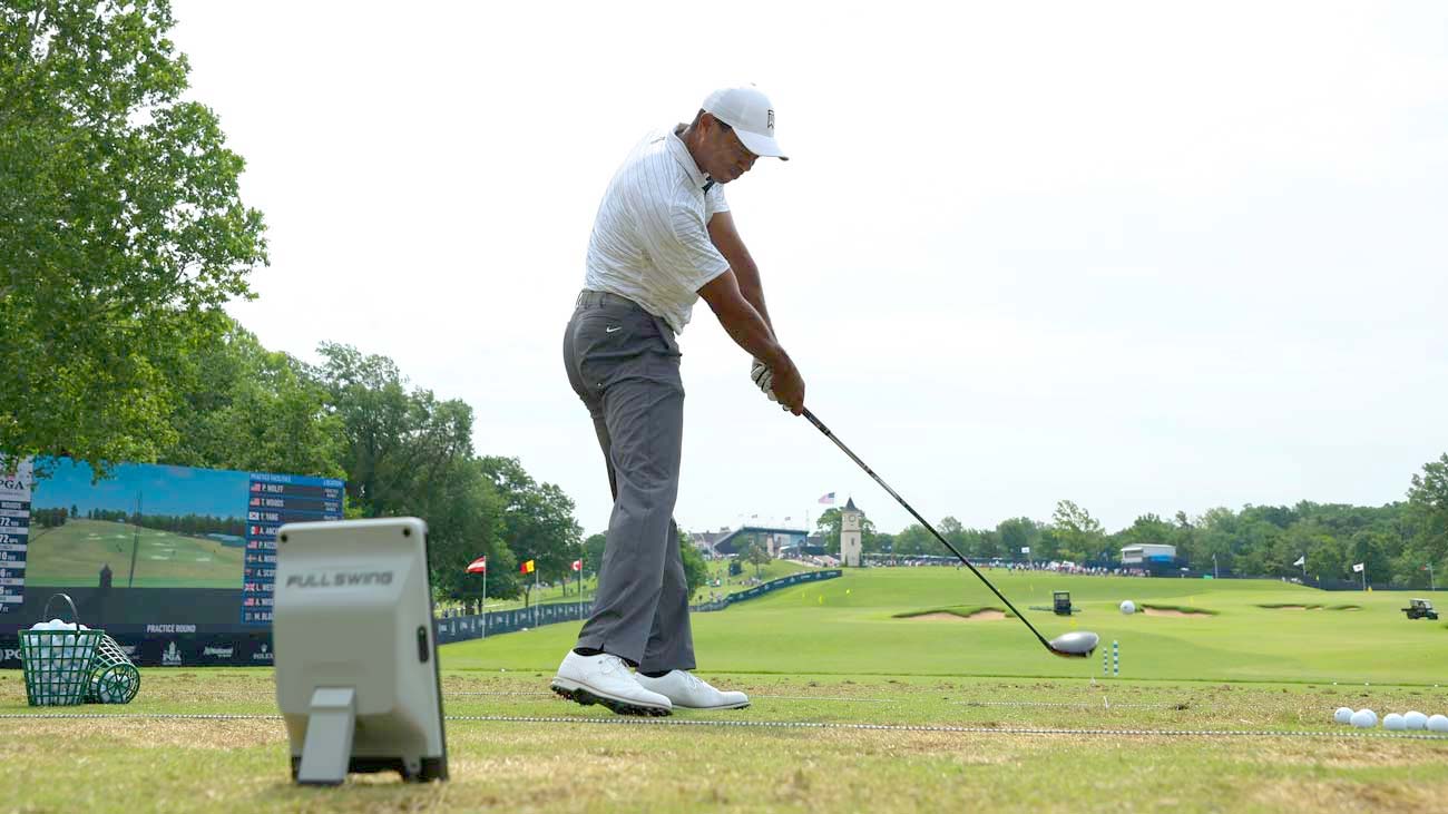 tiger woods on driving range