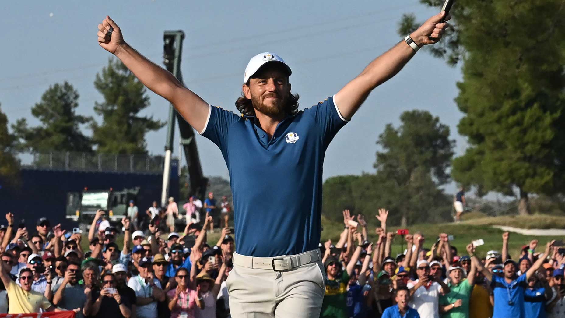 Europe&rsquo;s English golfer, Tommy Fleetwood celebrates the winning putt on the 17th green during his singles match against US golfer, Rickie Fowler on the final day of play in the 44th Ryder Cup at the Marco Simone Golf and Country Club in Rome on October 1, 2023.