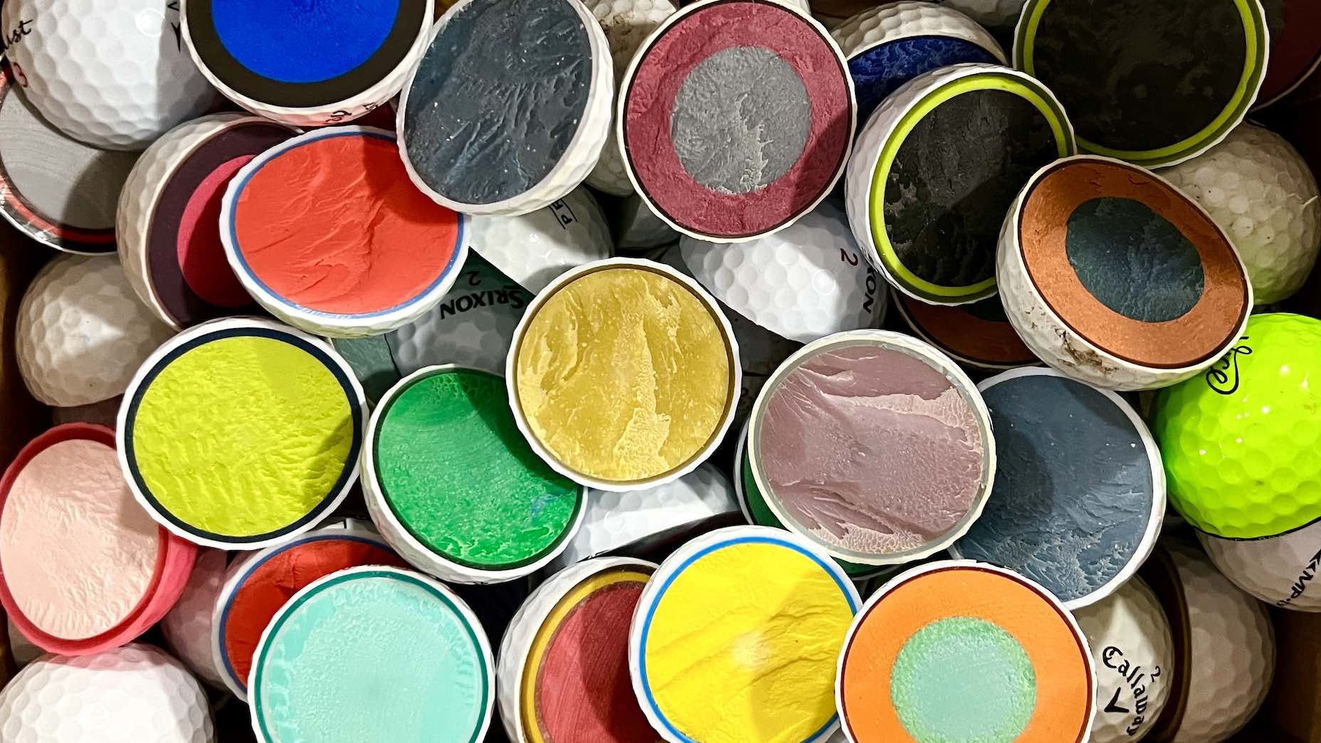 Golf balls cut in half cores