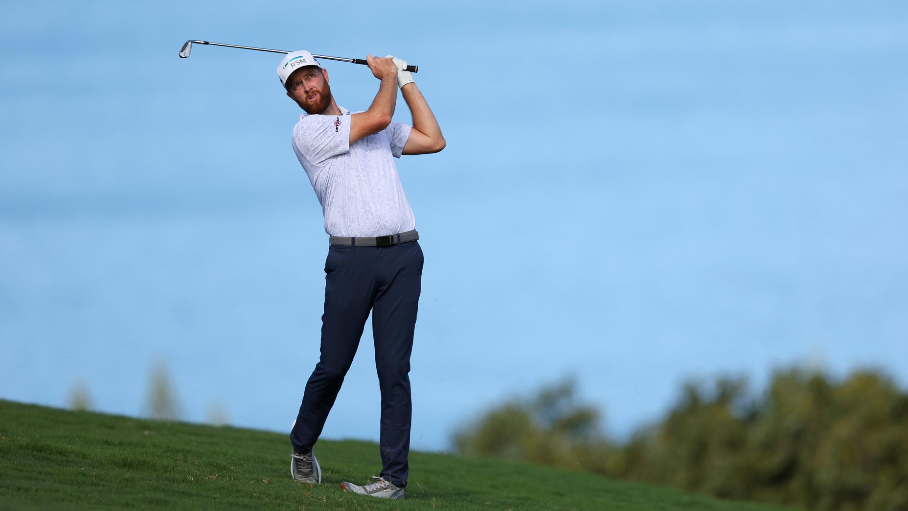 Chris Kirk plays an approach shot during the Sentry.