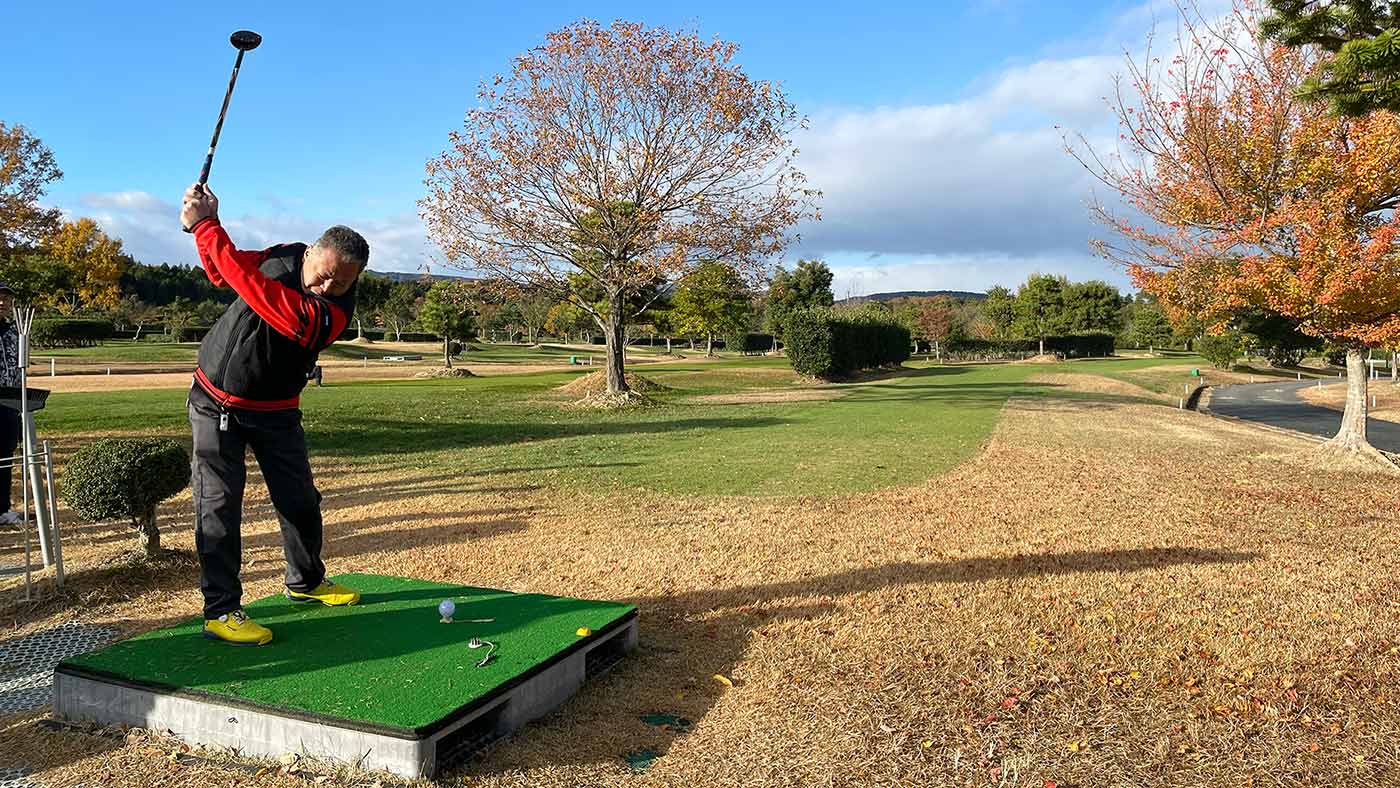 A golfer tees off at the All-Japan Park Golf Championship