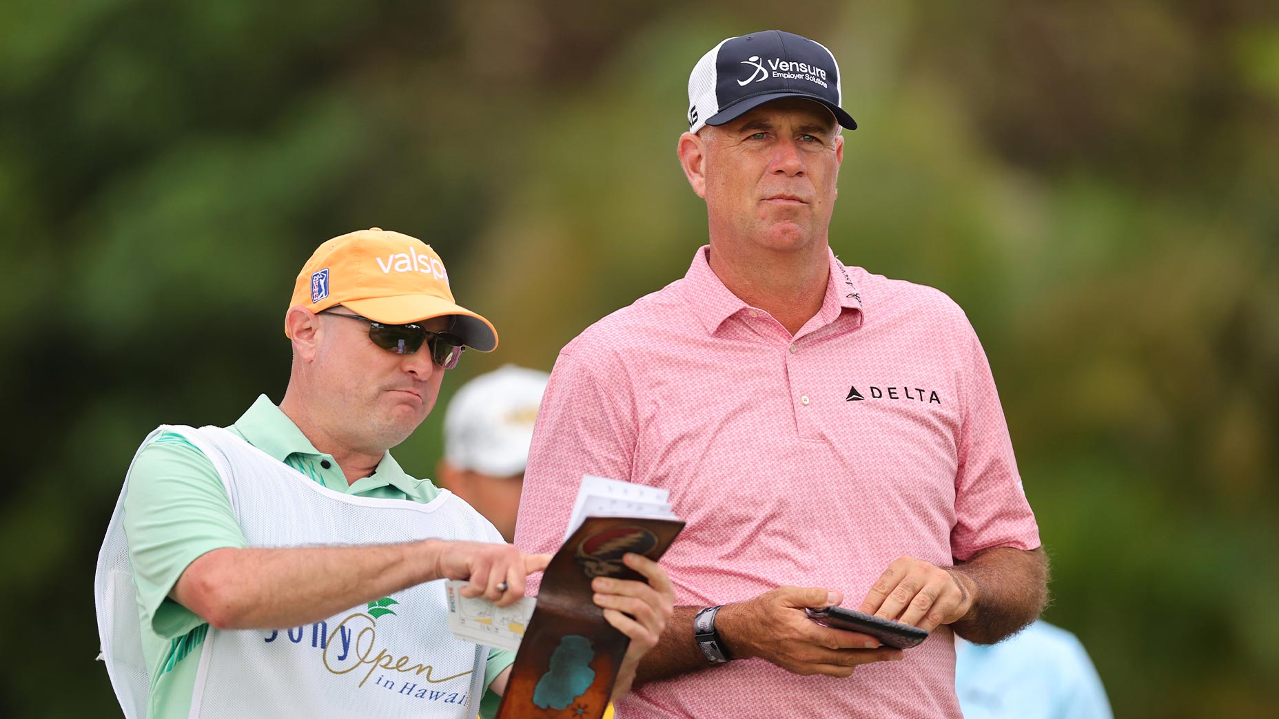 stewart cink stands with caddie at sony open in hawaii